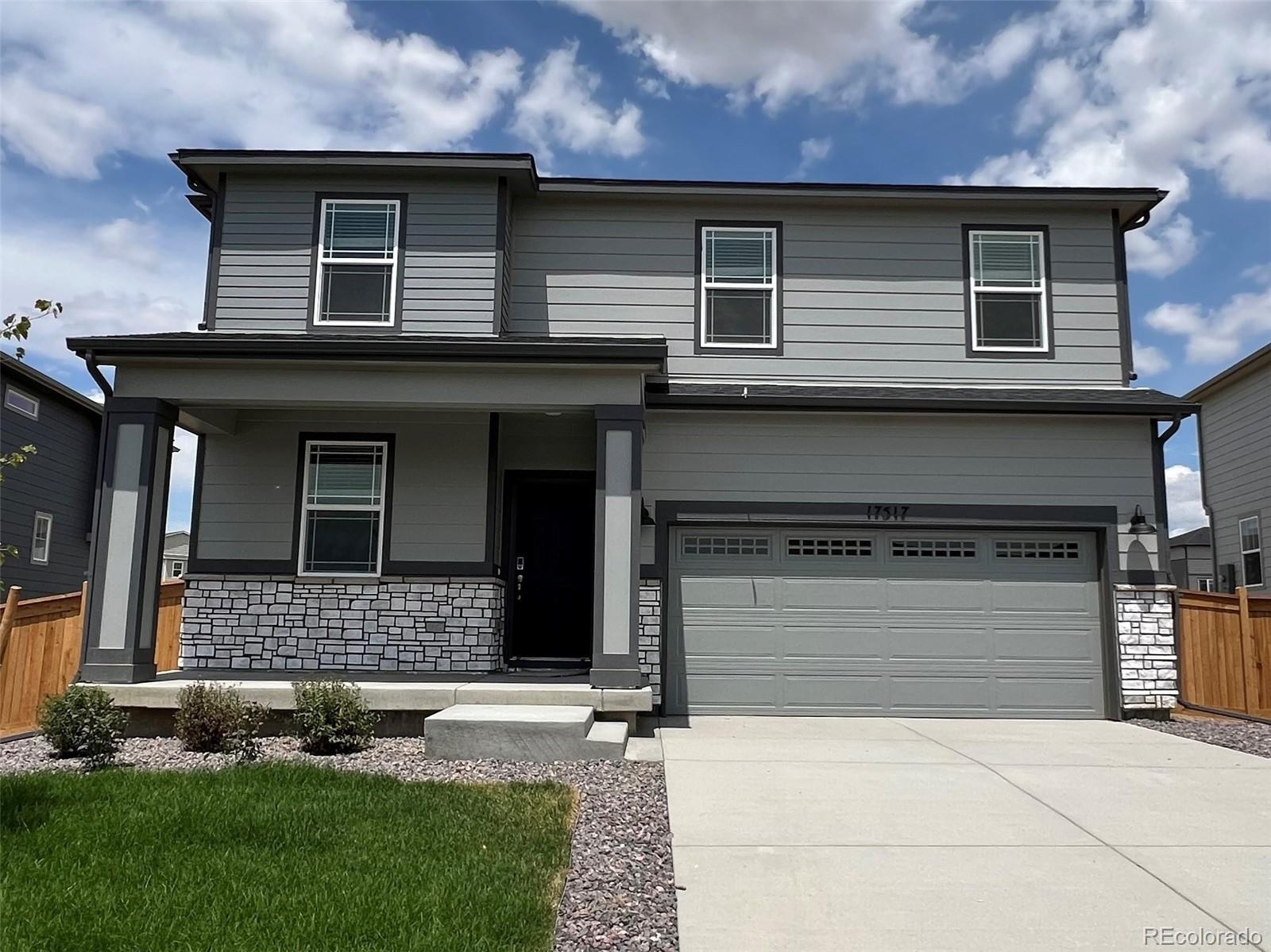 17517 E 89th Way, commerce city MLS: 8705522 Beds: 3 Baths: 3 Price: $556,990