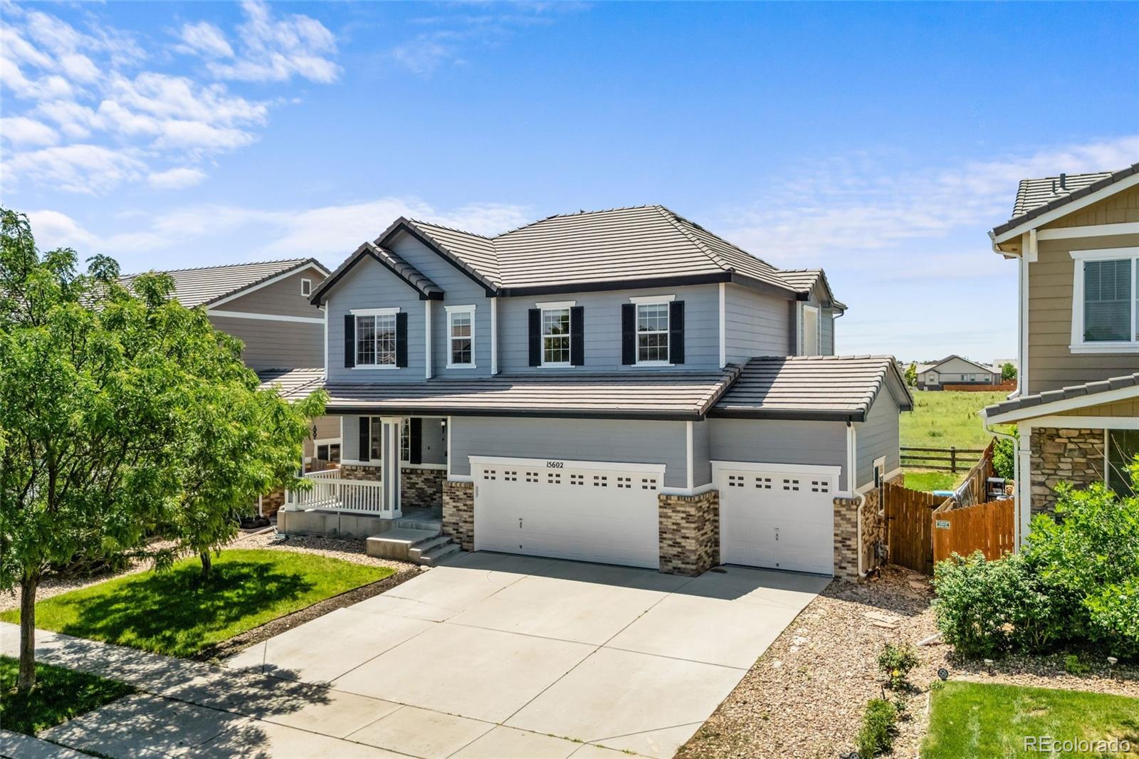 15602 E 117th Avenue, commerce city MLS: 4510553 Beds: 4 Baths: 3 Price: $619,500