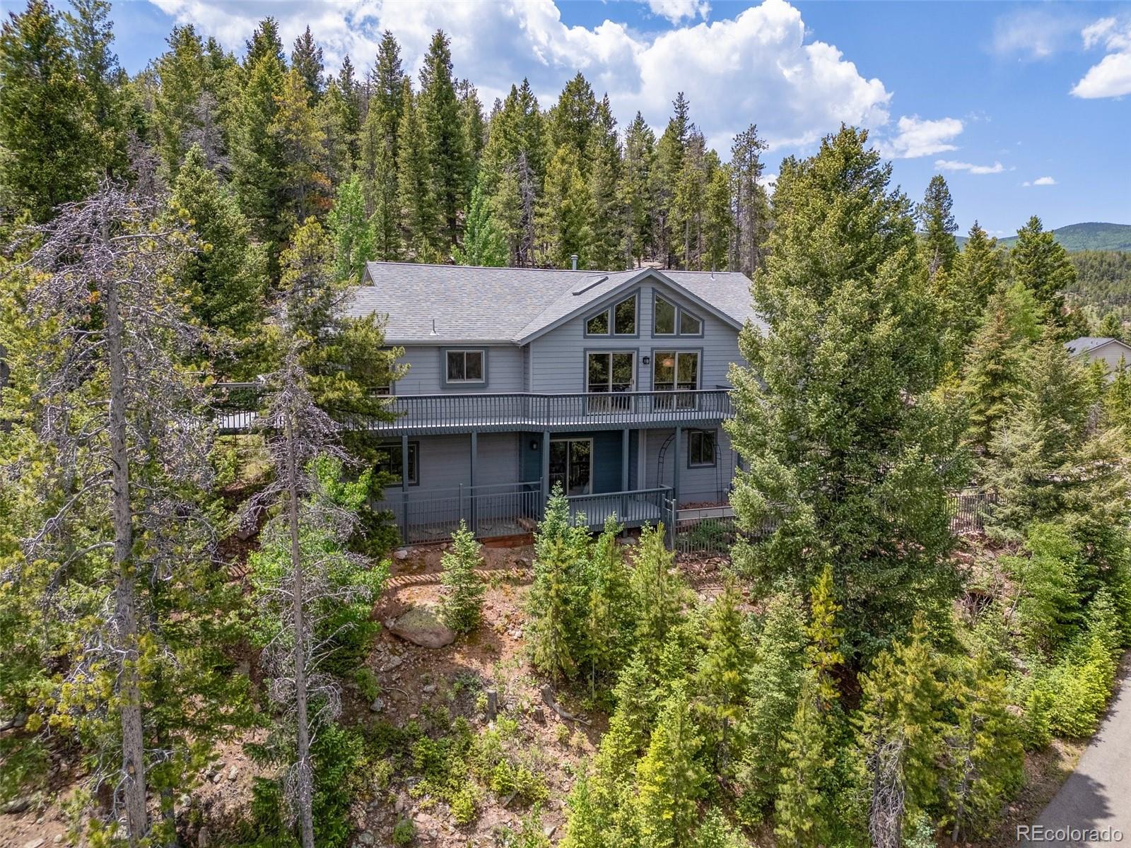 6882  Snowshoe Trail, evergreen MLS: 8890657 Beds: 3 Baths: 3 Price: $910,000