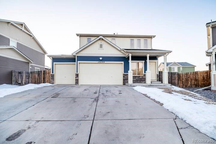 10669  Worchester Drive, commerce city MLS: 2206471 Beds: 5 Baths: 4 Price: $585,000