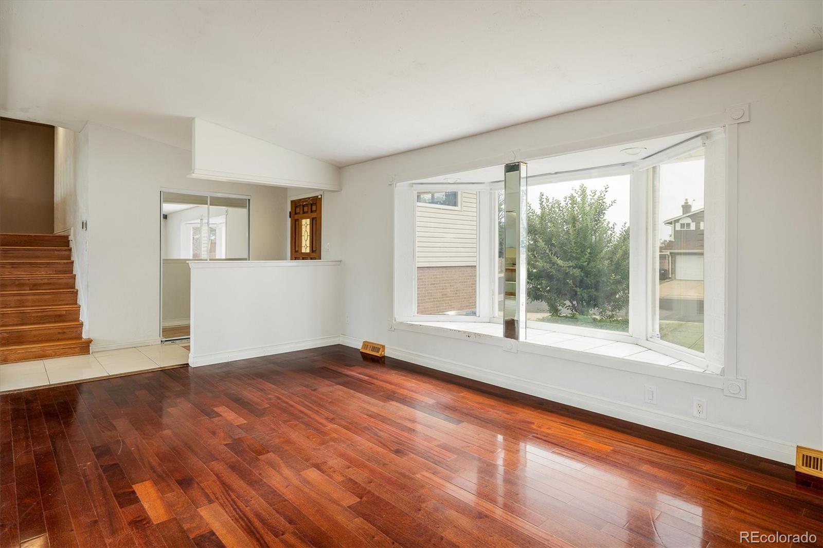 7210  Otis Court, arvada MLS: 9570918 Beds: 5 Baths: 4 Price: $575,000