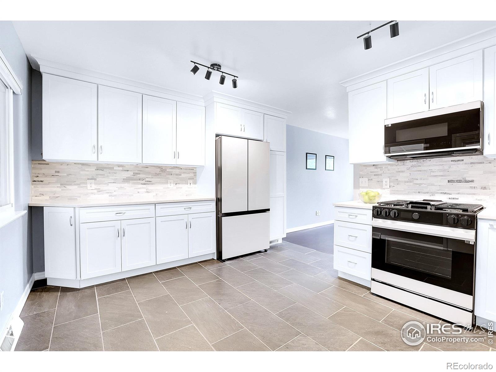 8030  Ogden Street, denver MLS: 4567891038006 Beds: 3 Baths: 3 Price: $450,000