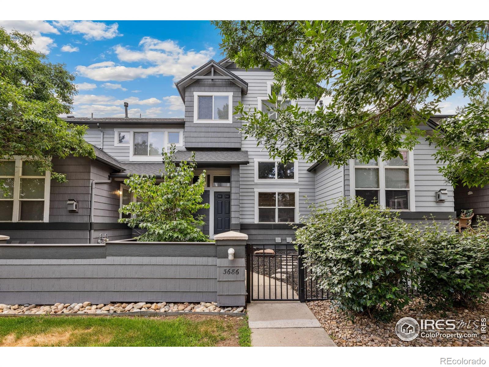 3686  Oakwood Drive, longmont MLS: 4567891038498 Beds: 3 Baths: 3 Price: $500,000
