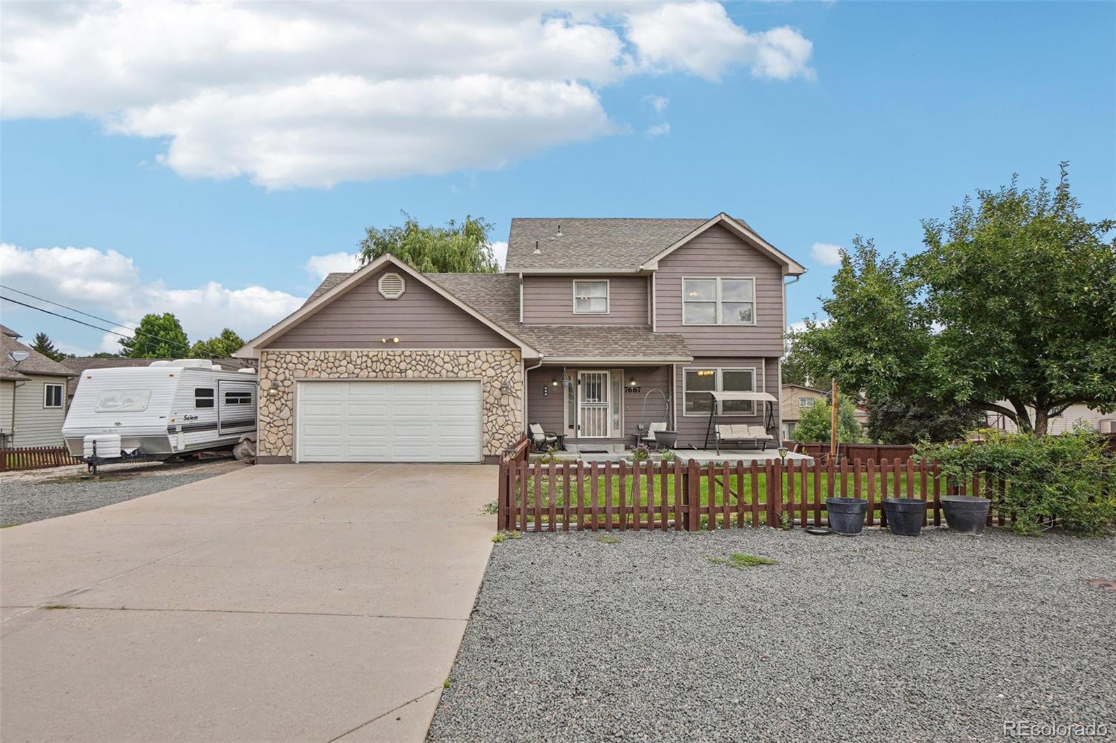 7667 W Brook Drive, littleton MLS: 1685310 Beds: 5 Baths: 4 Price: $765,000