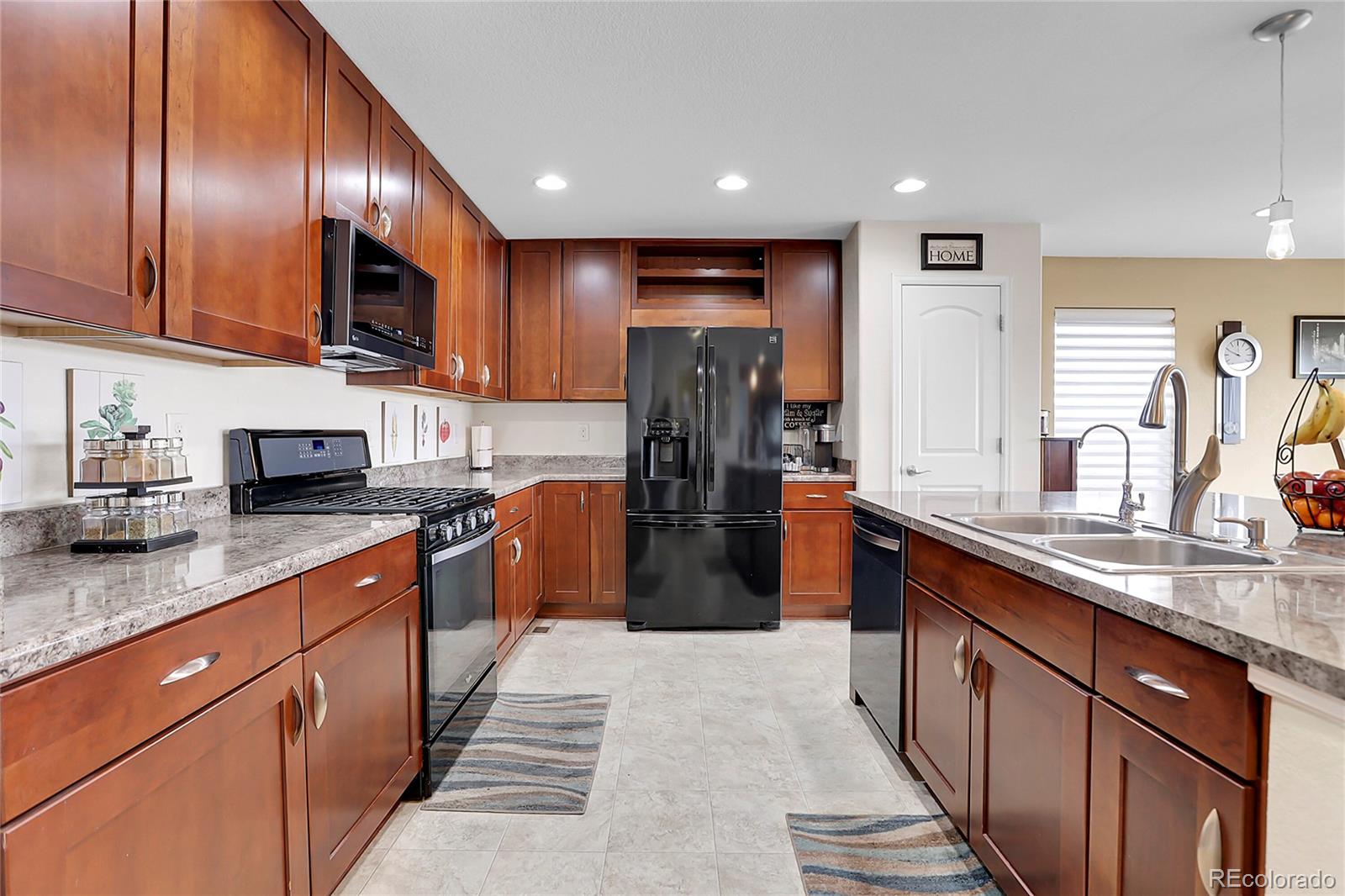 9868  Olathe Street, commerce city MLS: 3349814 Beds: 3 Baths: 3 Price: $550,000