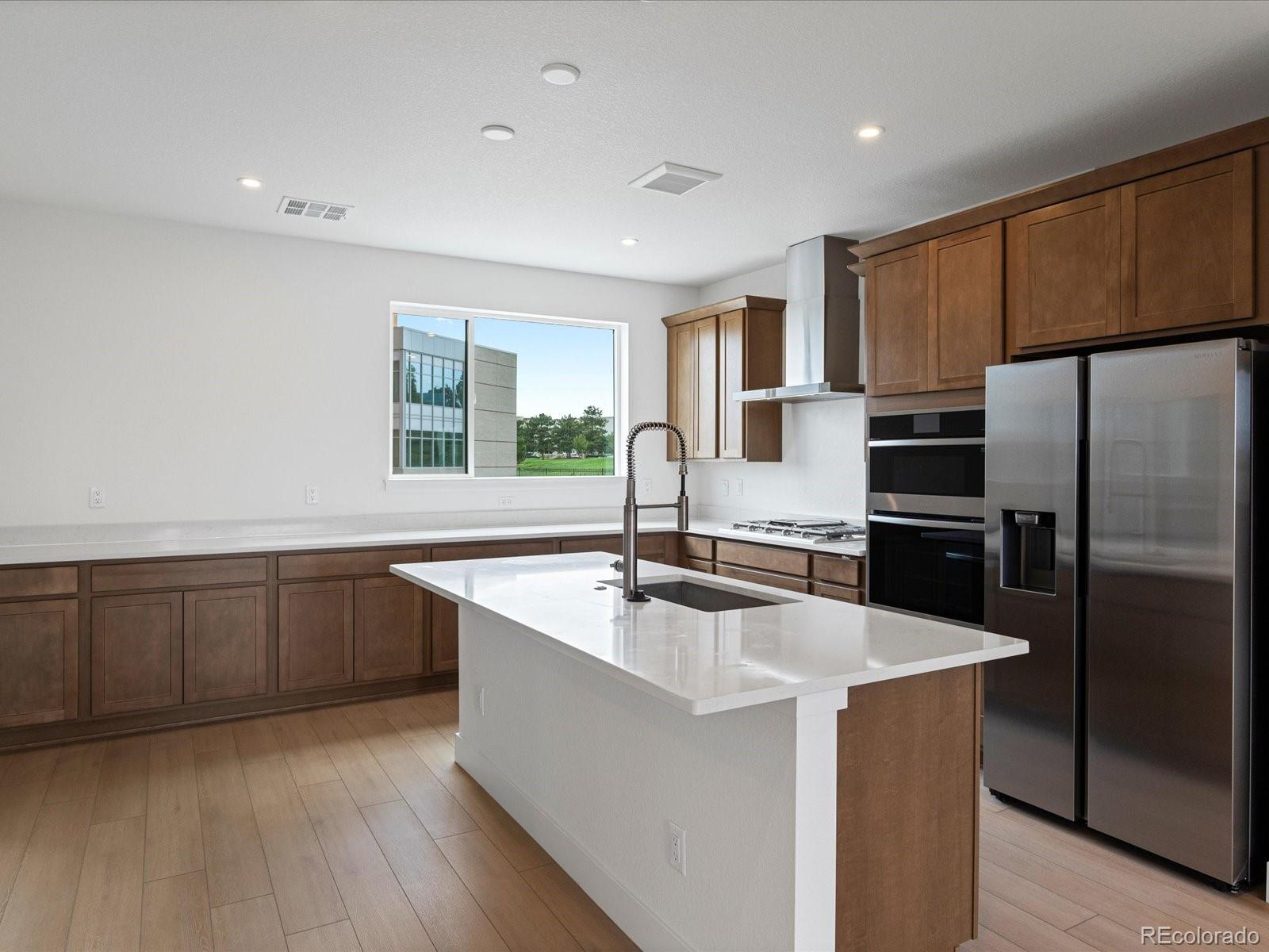 12  Ascent Trail , Englewood  MLS: 2666779 Beds: 4 Baths: 3 Price: $709,990