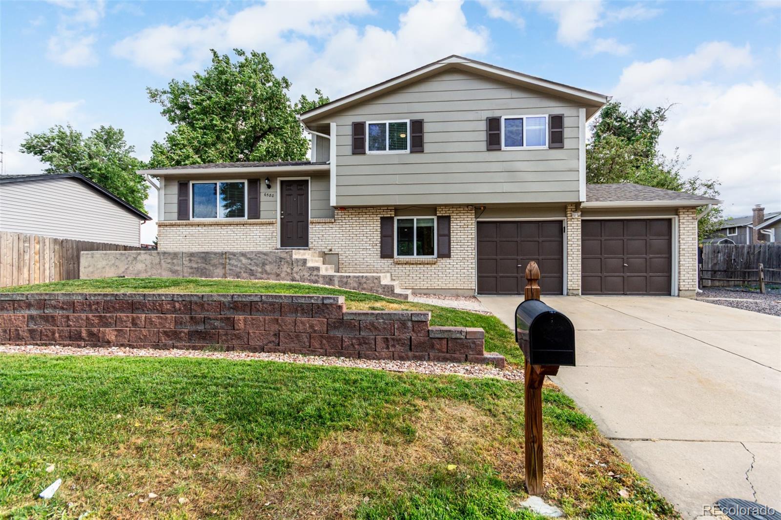 6580 W 74th Place, arvada MLS: 8429011 Beds: 4 Baths: 2 Price: $620,000