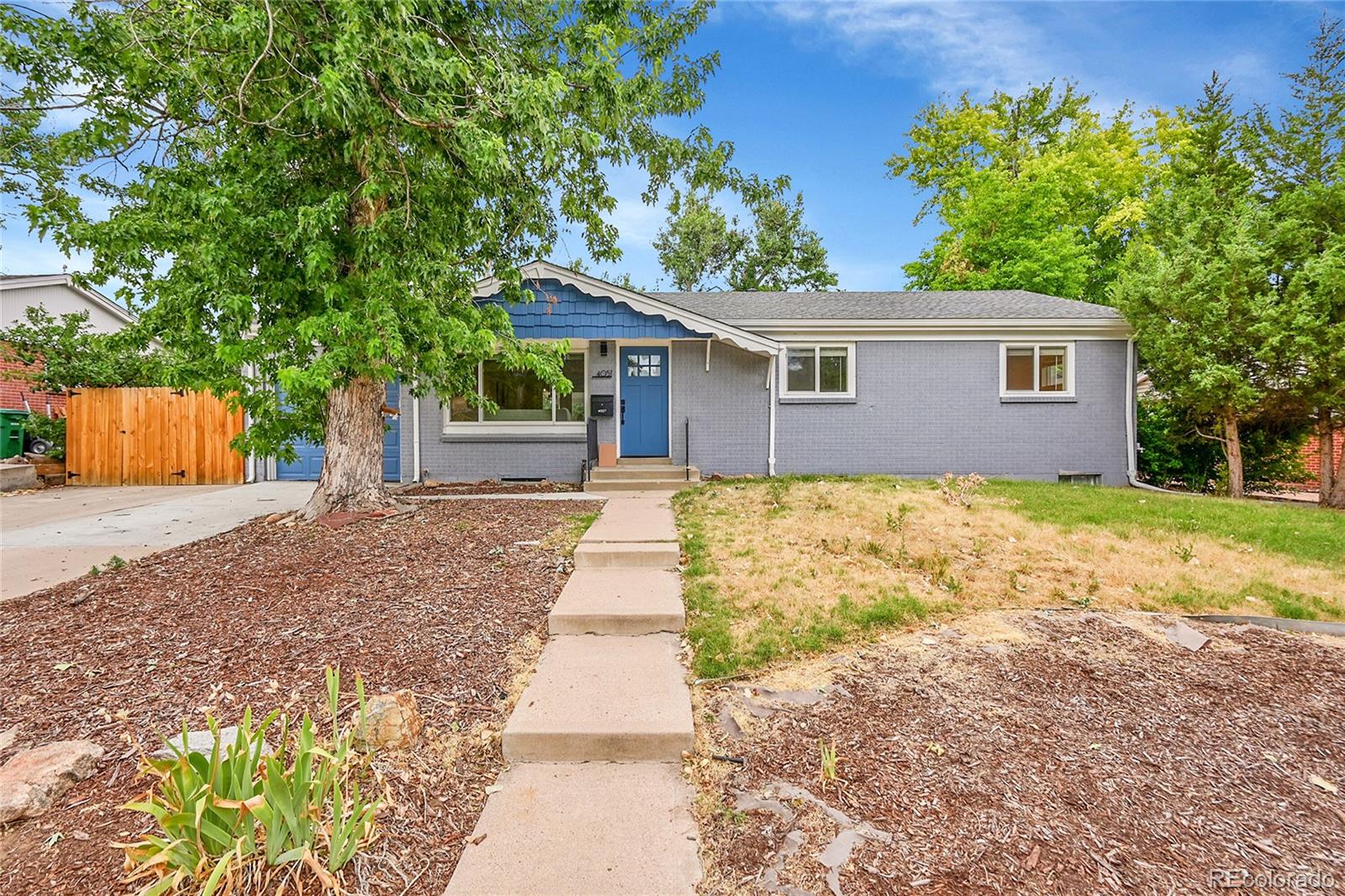 4057 W Grand Avenue, littleton MLS: 4747891 Beds: 4 Baths: 3 Price: $650,000