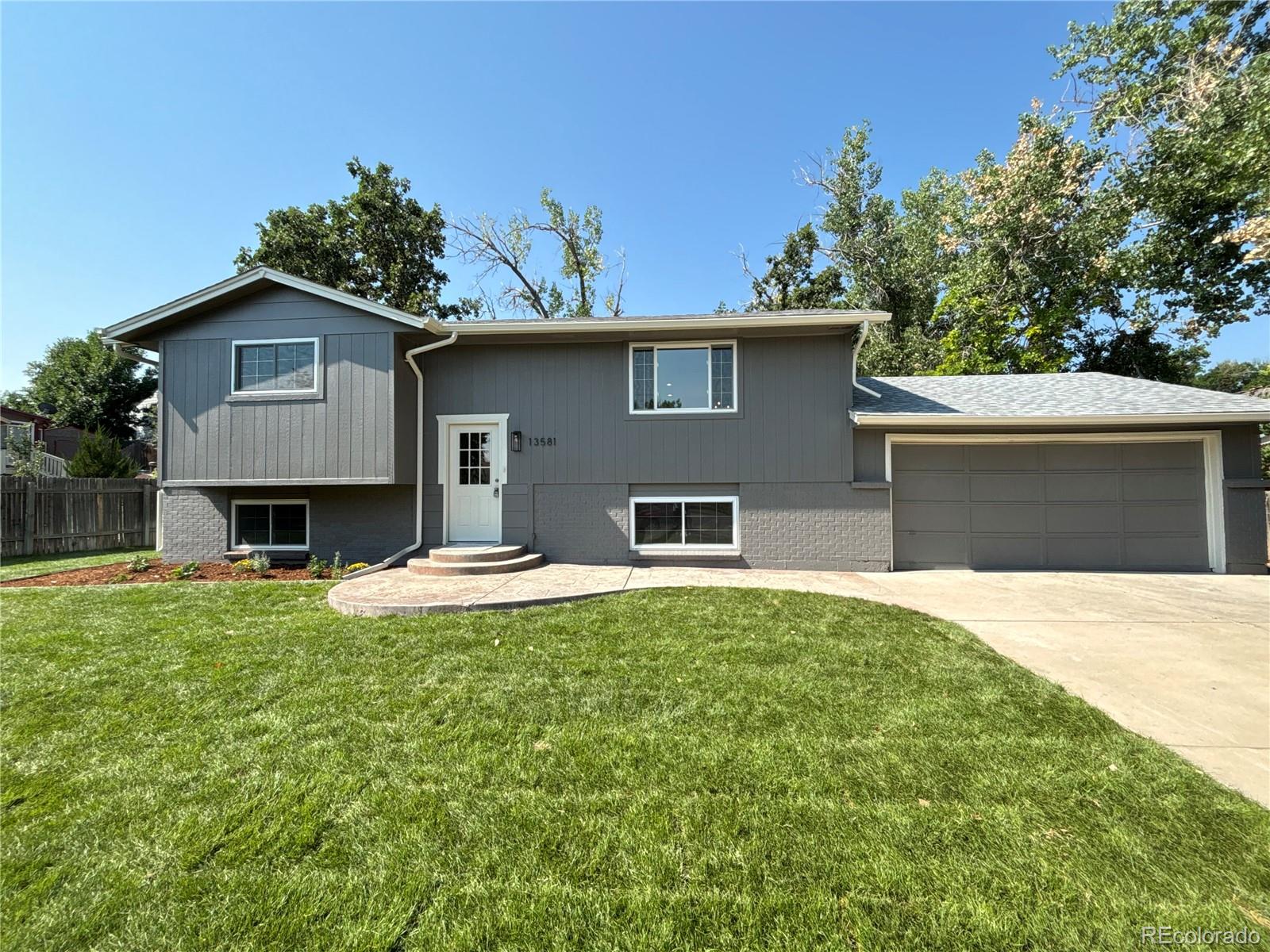 13581  Achilles Drive, lone tree MLS: 3272357 Beds: 5 Baths: 2 Price: $610,000