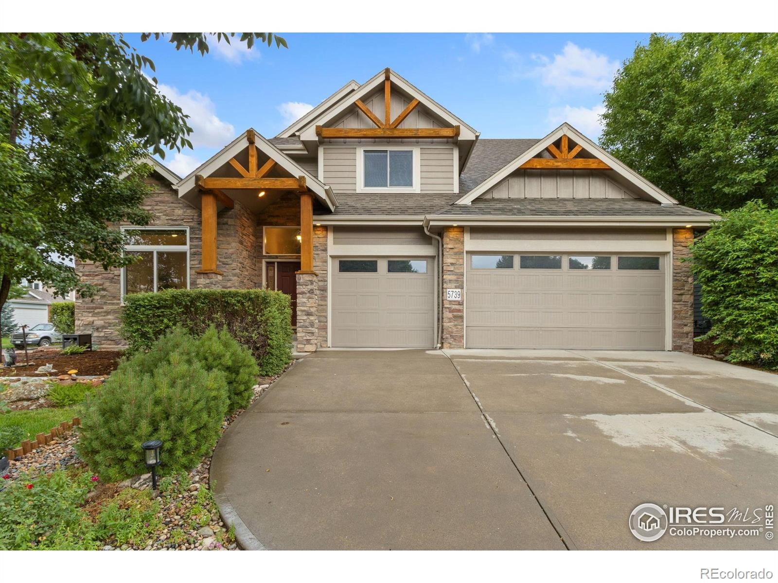 5739  Falling Water Drive, fort collins MLS: 4567891039699 Beds: 5 Baths: 4 Price: $1,075,000