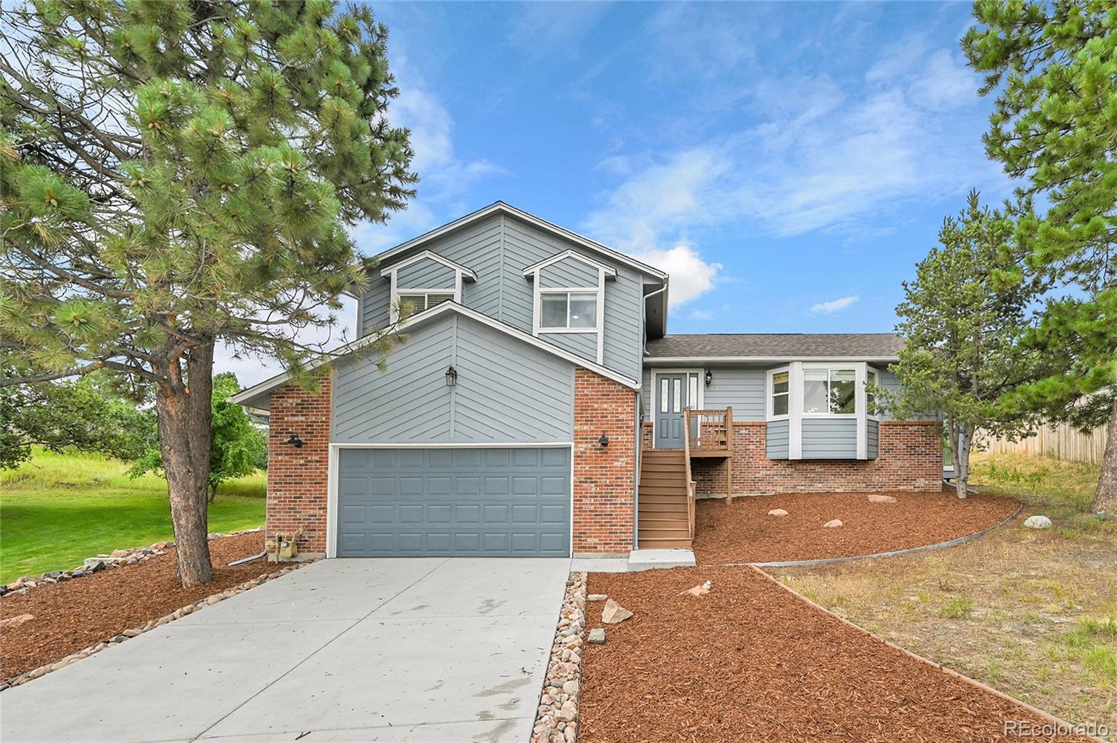 8916  Sunridge Hollow Road, parker MLS: 4427488 Beds: 4 Baths: 3 Price: $700,000