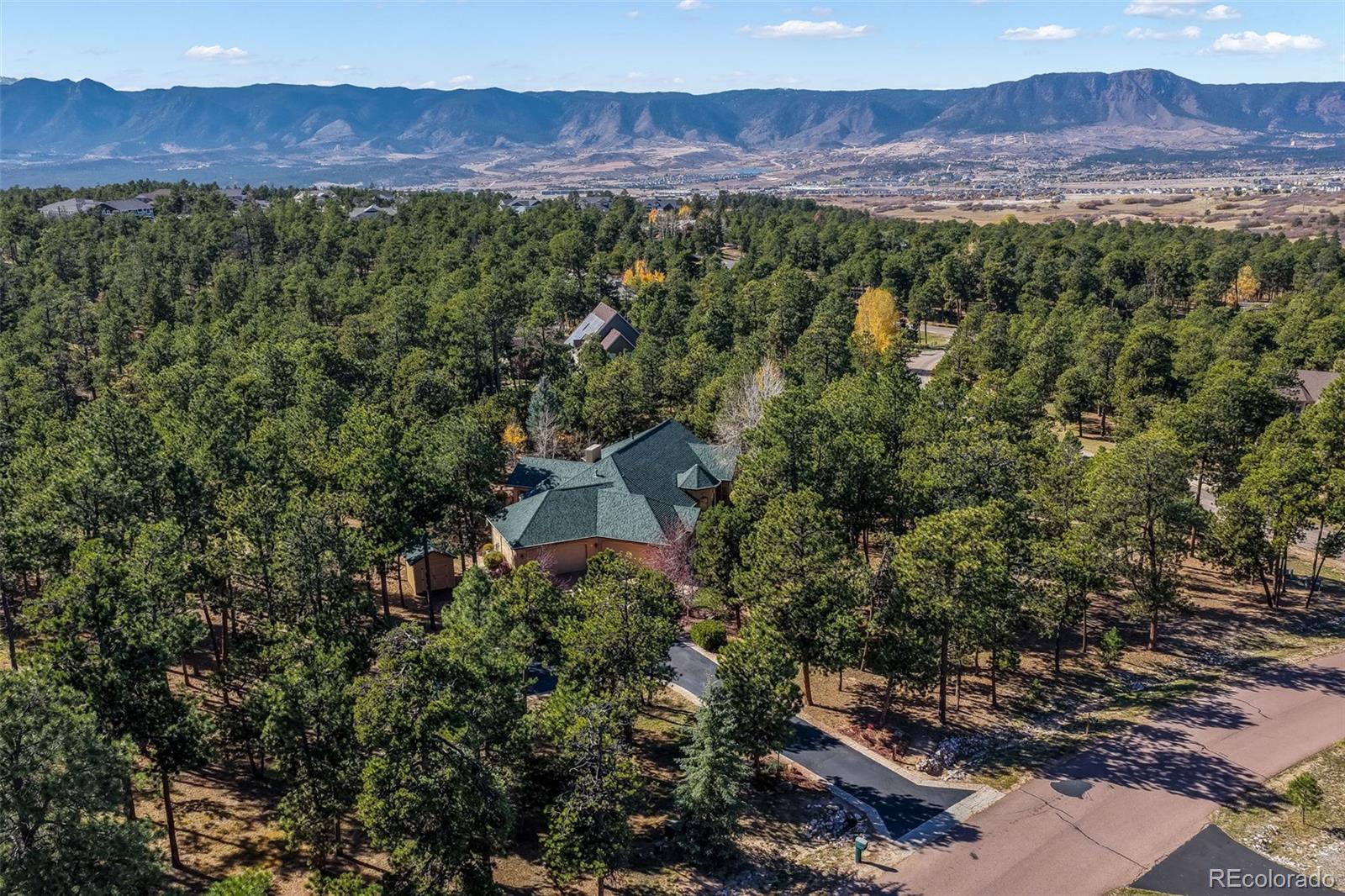 Higby Estates Monument Home | MLS #: 555381317556  Colonial Park Drive, Monument Beds: 4 Baths: 5 Price: $1,300,000