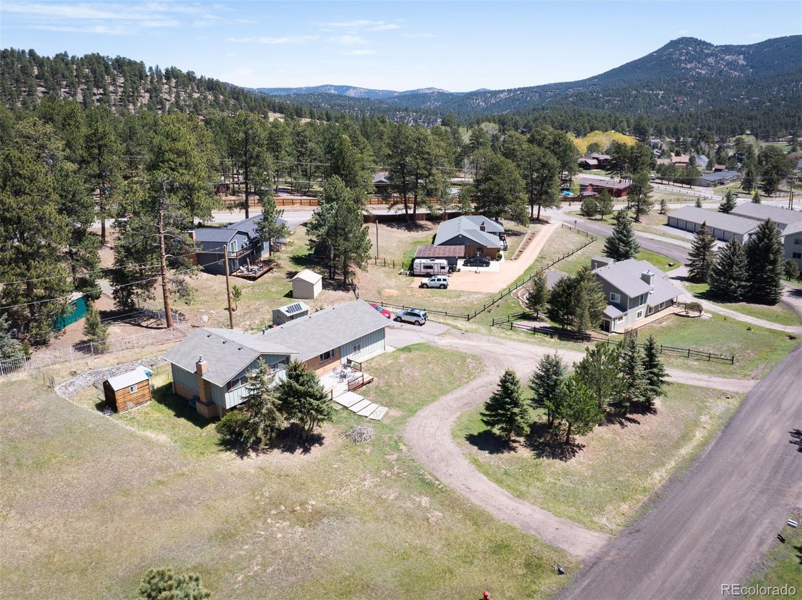  Evergreen Home | MLS #: 719125929775  Woods Drive, Evergreen Beds: 4 Baths: 2 Price: $675,000