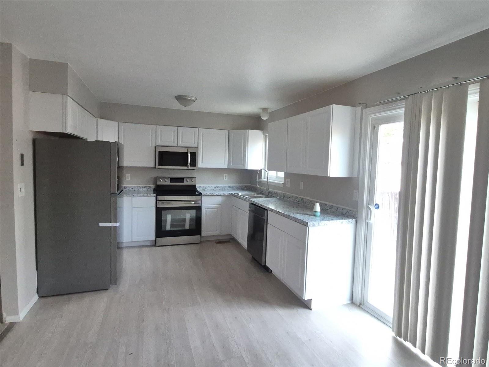 Mission Viejo Aurora Home | MLS #: 929543916743 E Kenyon Drive, Aurora Beds: 3 Baths: 3 Price: $454,900