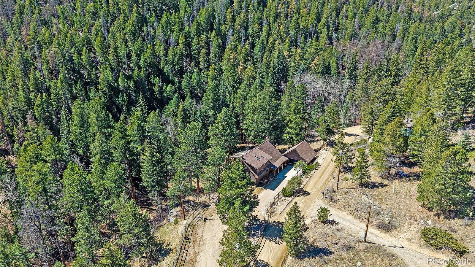  Evergreen Home | MLS #: 25286611385  Beaver Brook Canyon Road, Evergreen Beds: 3 Baths: 3 Price: $1,040,000