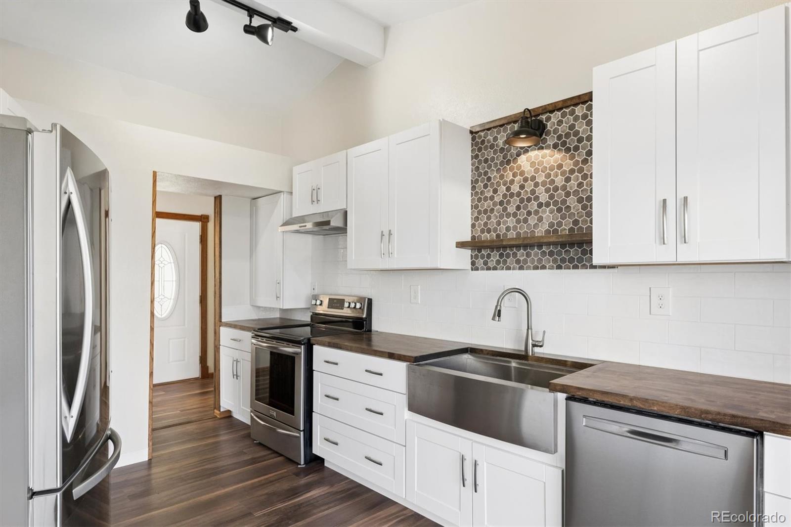 Ralston Valley Arvada Home | MLS #: 311302213805 W 82nd Avenue, Arvada Beds: 4 Baths: 2 Price: $875,000