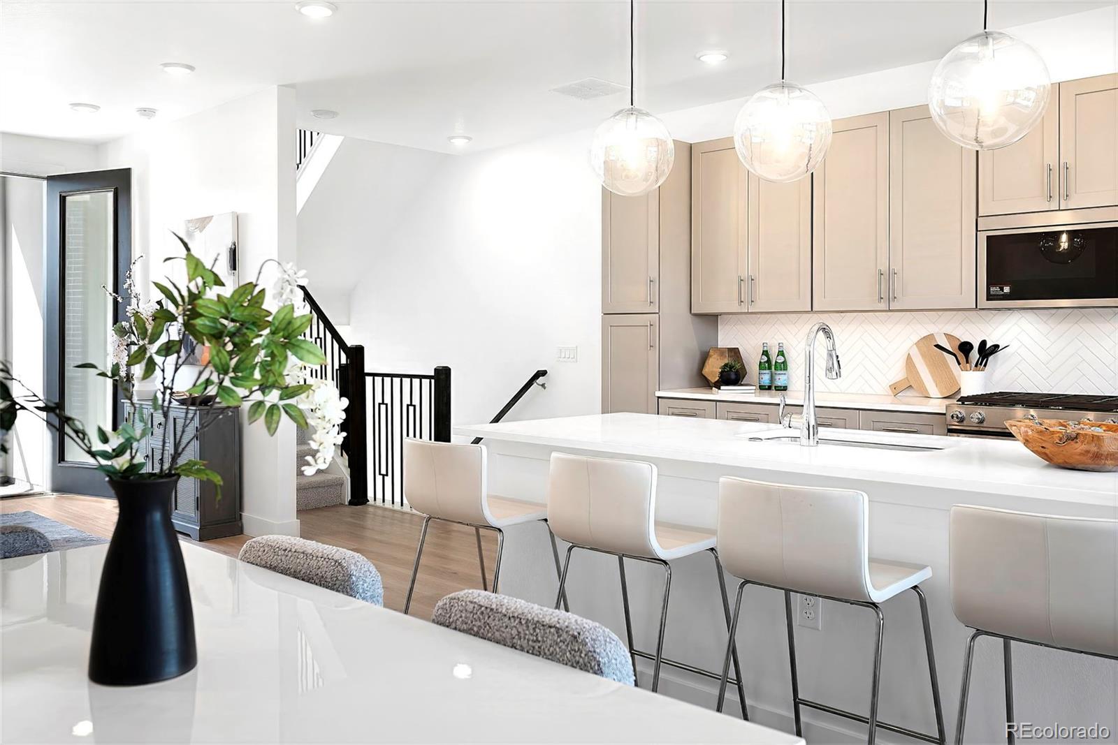 Lowry Denver Home | MLS #: 754085022  Oneida Court, Denver Beds: 2 Baths: 3 Price: $787,000