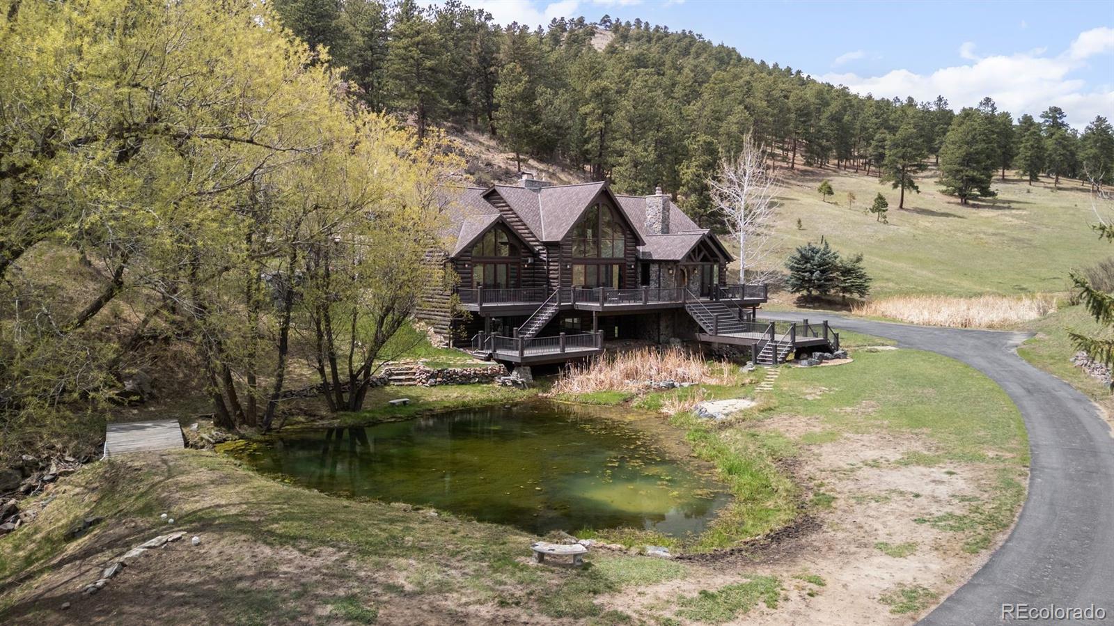 Kerr Gulch Evergreen Home | MLS #: 61506081733  Swede Gulch Road, Evergreen Beds: 4 Baths: 6 Price: $2,995,000