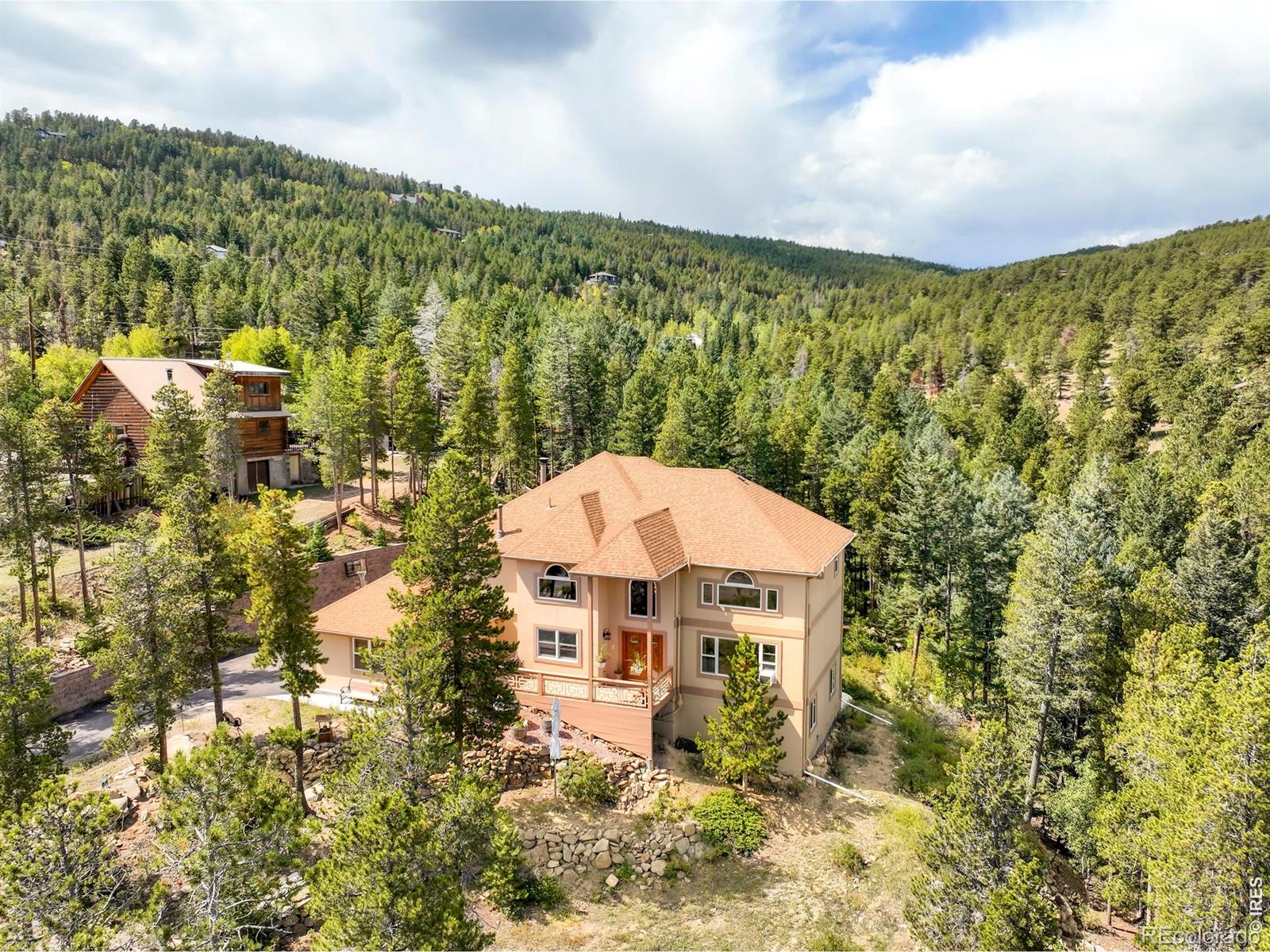 Coal Creek Golden Home | MLS #: 456789105612512023  Coal Creek Heights Drive, Golden Beds: 4 Baths: 4 Price: $1,350,000