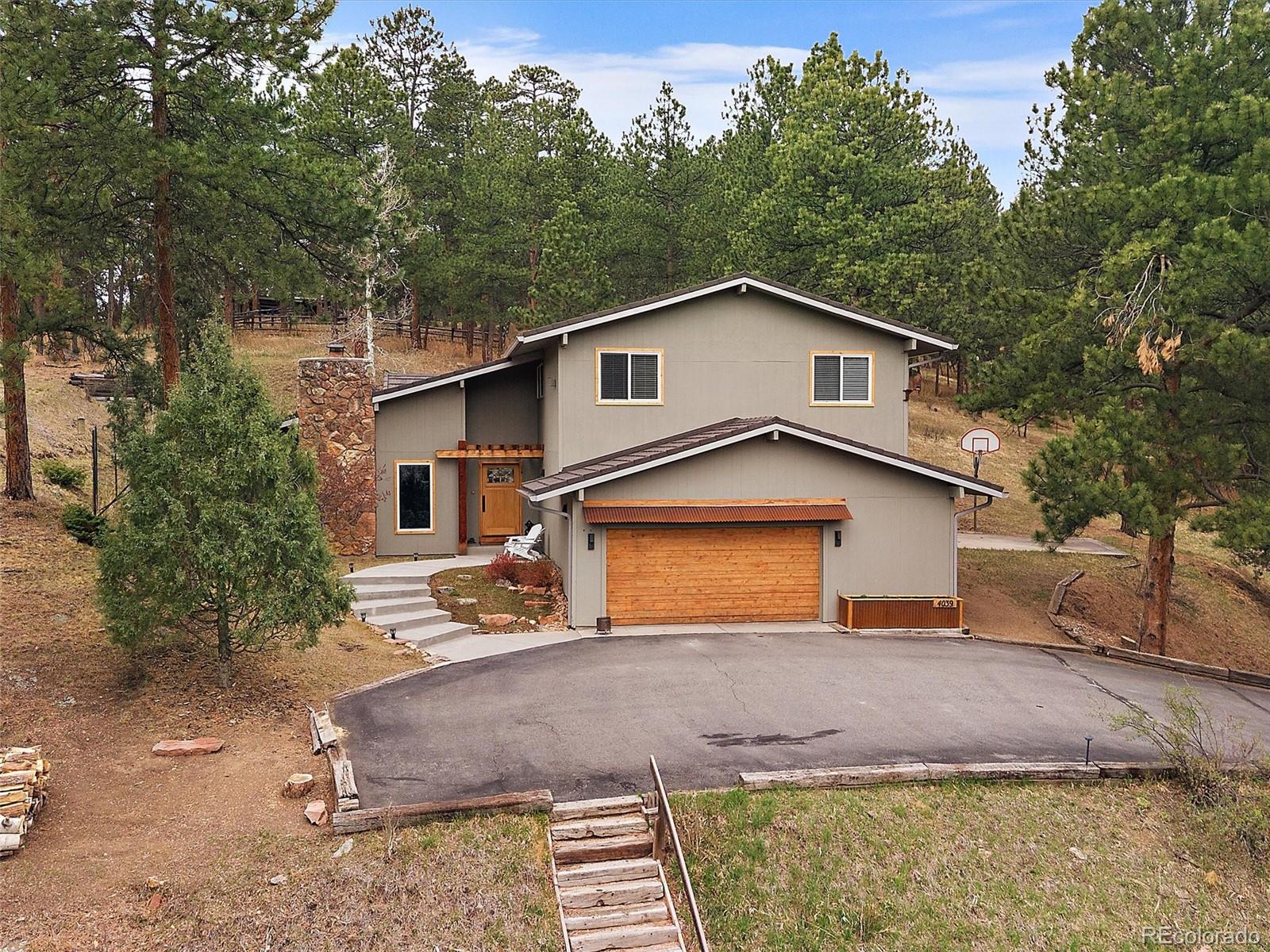 Hiwan Hills Evergreen Home | MLS #: 17179044039  Histead Way, Evergreen Beds: 4 Baths: 3 Price: $985,000
