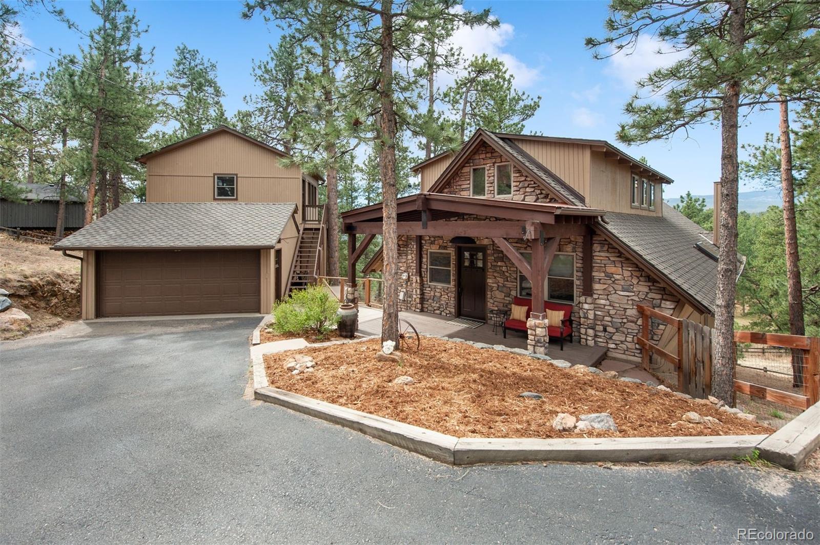 Hiwan Hills Evergreen Home | MLS #: 882648629310  Buchanan Drive, Evergreen Beds: 4 Baths: 3 Price: $1,425,000
