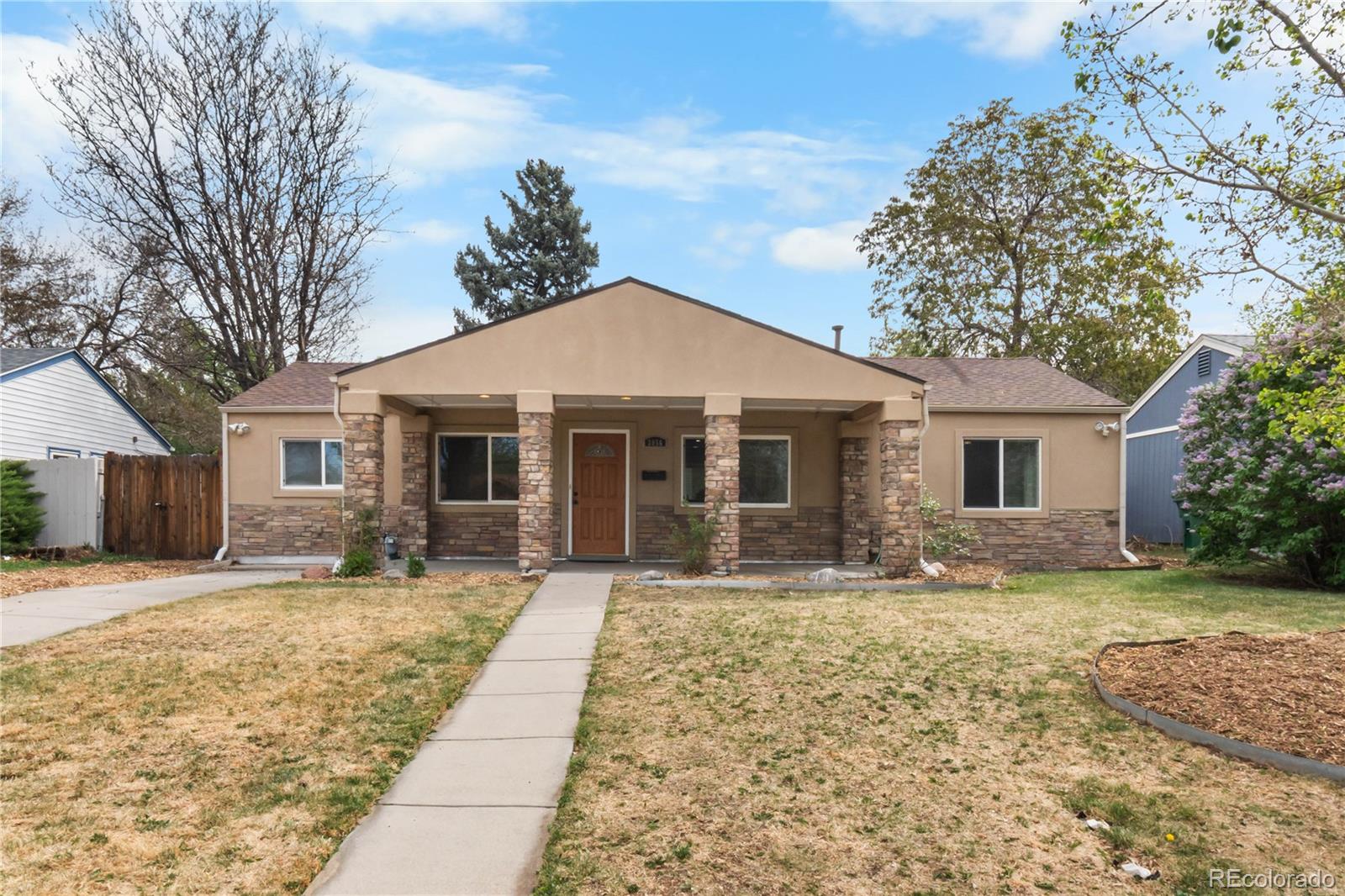 University Hills Denver Home | MLS #: 71422303056 S Grape Way, Denver Beds: 4 Baths: 2 Price: $498,000