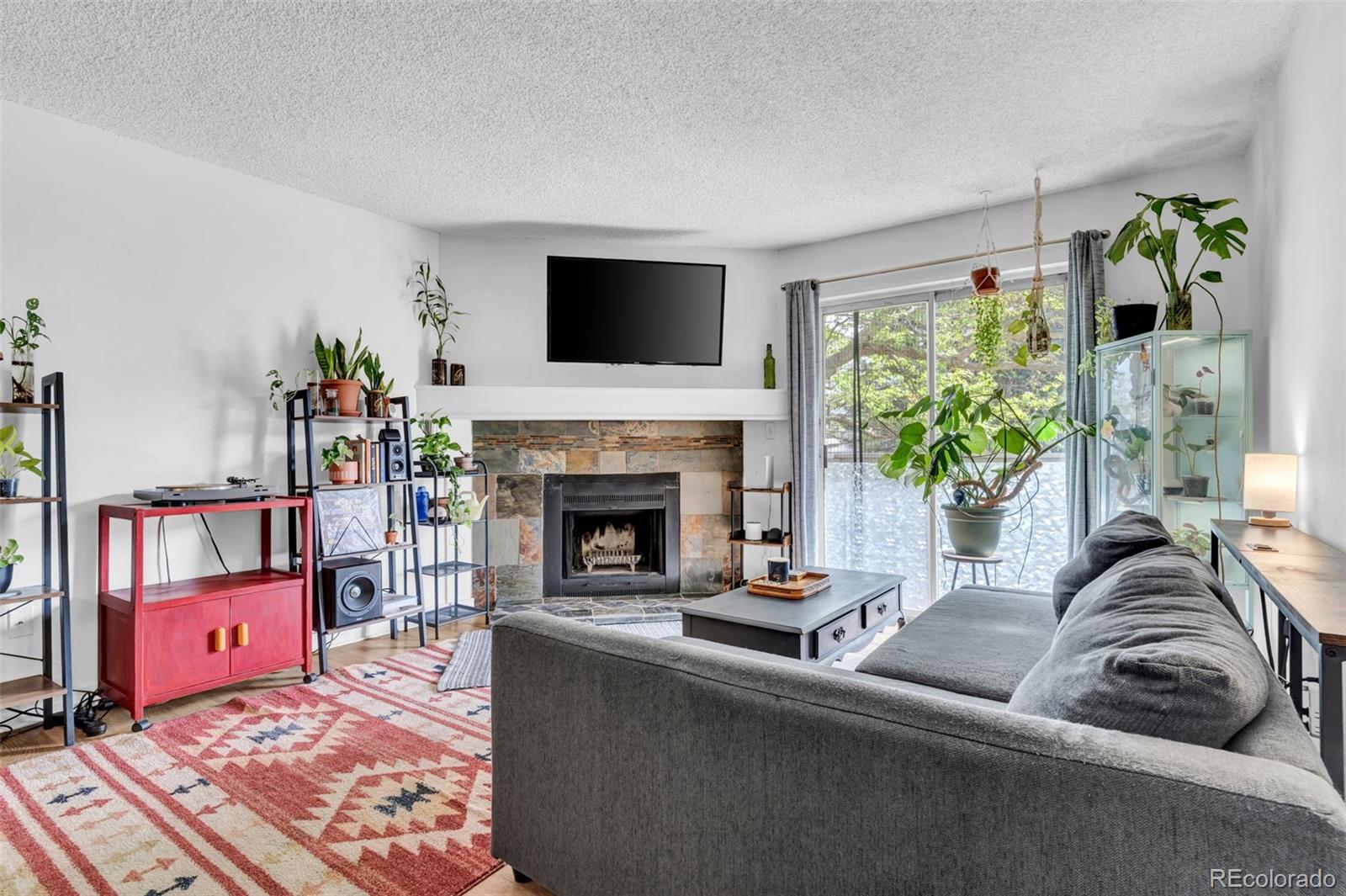 Moore Denver Condo / Townhome | MLS #: 49003384400 S Quebec Street 103L, Denver Beds: 2 Baths: 2 Price: $259,900