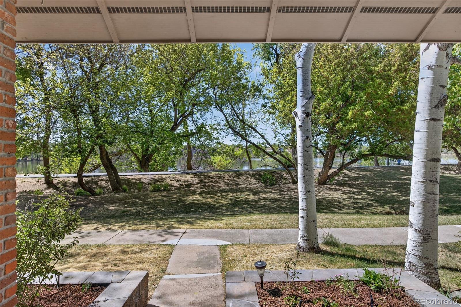 Pond Arvada Home | MLS #: 85927398625  Garland Court, Arvada Beds: 3 Baths: 3 Price: $739,000