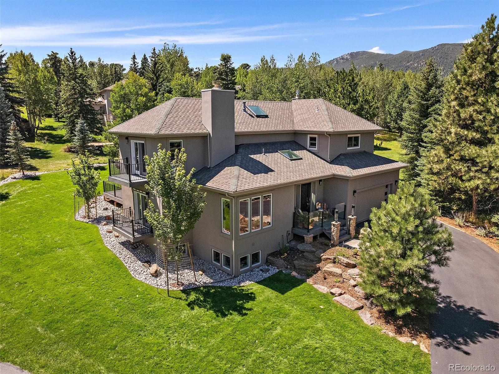 Hiwan Evergreen Home | MLS #: 20708652100  Island Lane, Evergreen Beds: 4 Baths: 4 Price: $1,575,000