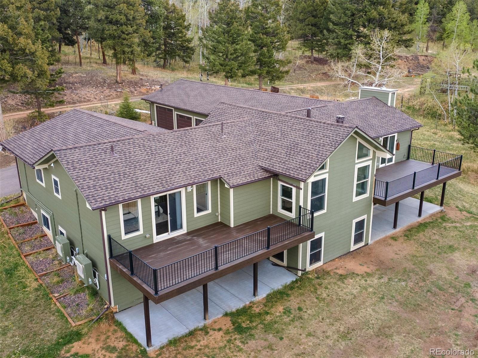 Richmond Hill Conifer Home | MLS #: 619448512300  Coyote Song Trail, Conifer Beds: 4 Baths: 4 Price: $1,295,000