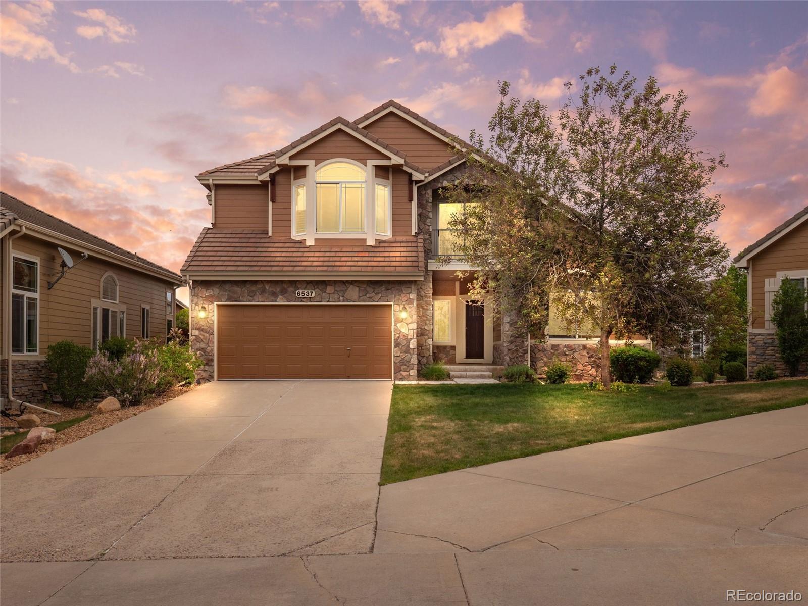 Trail Village Arvada Home | MLS #: 22171356537  Umber Circle, Arvada Beds: 5 Baths: 3 Price: $950,000