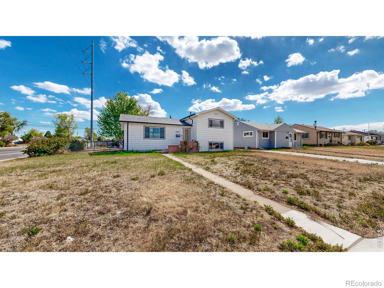 Houston Heights Greeley Home | MLS #: 45678910588942400 W 6th Street, Greeley Beds: 4 Baths: 2 Price: $345,000
