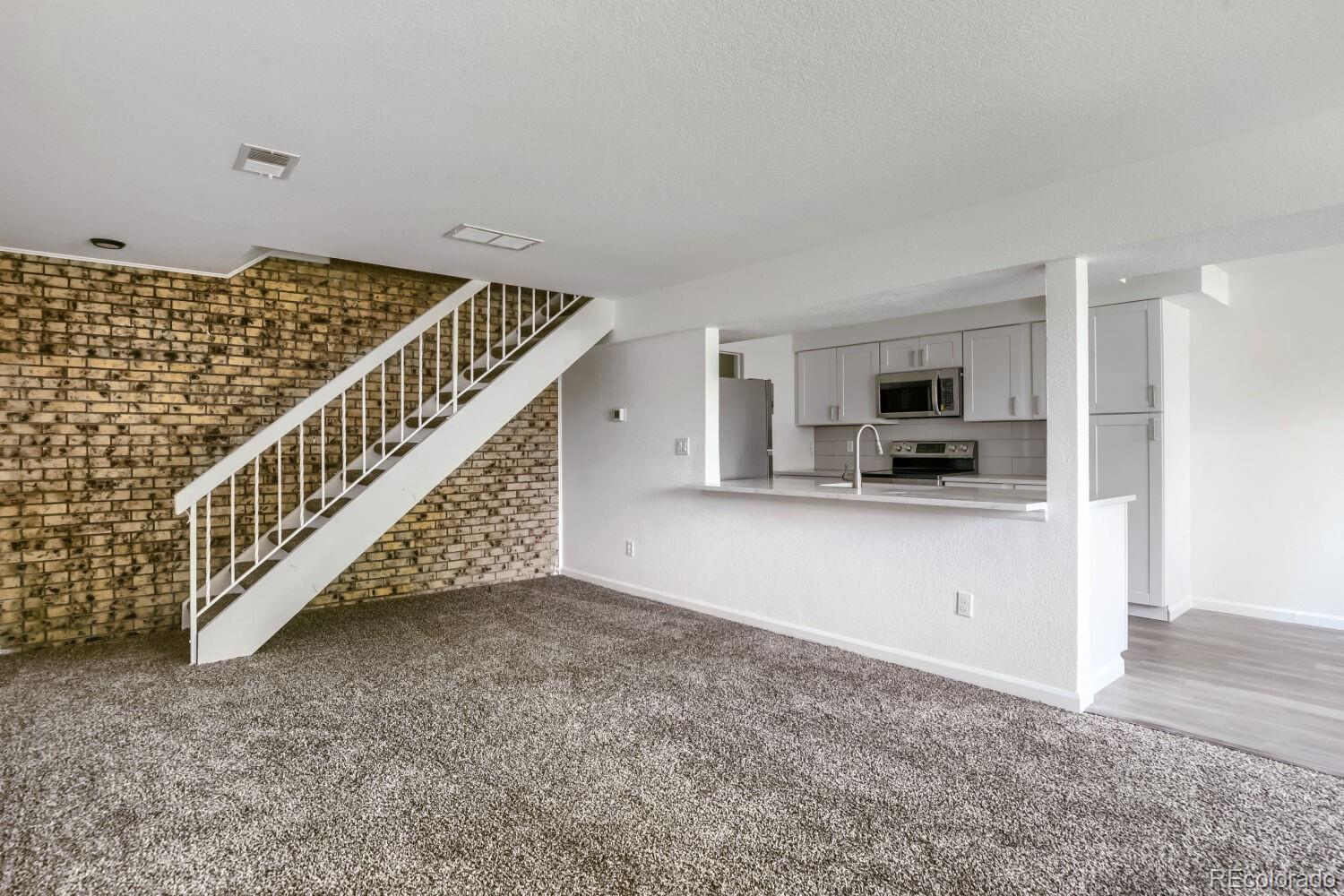 Nevin Village Aurora Condo / Townhome | MLS #: 33950711142 S Eagle Circle C, Aurora Beds: 2 Baths: 2 Price: $199,000