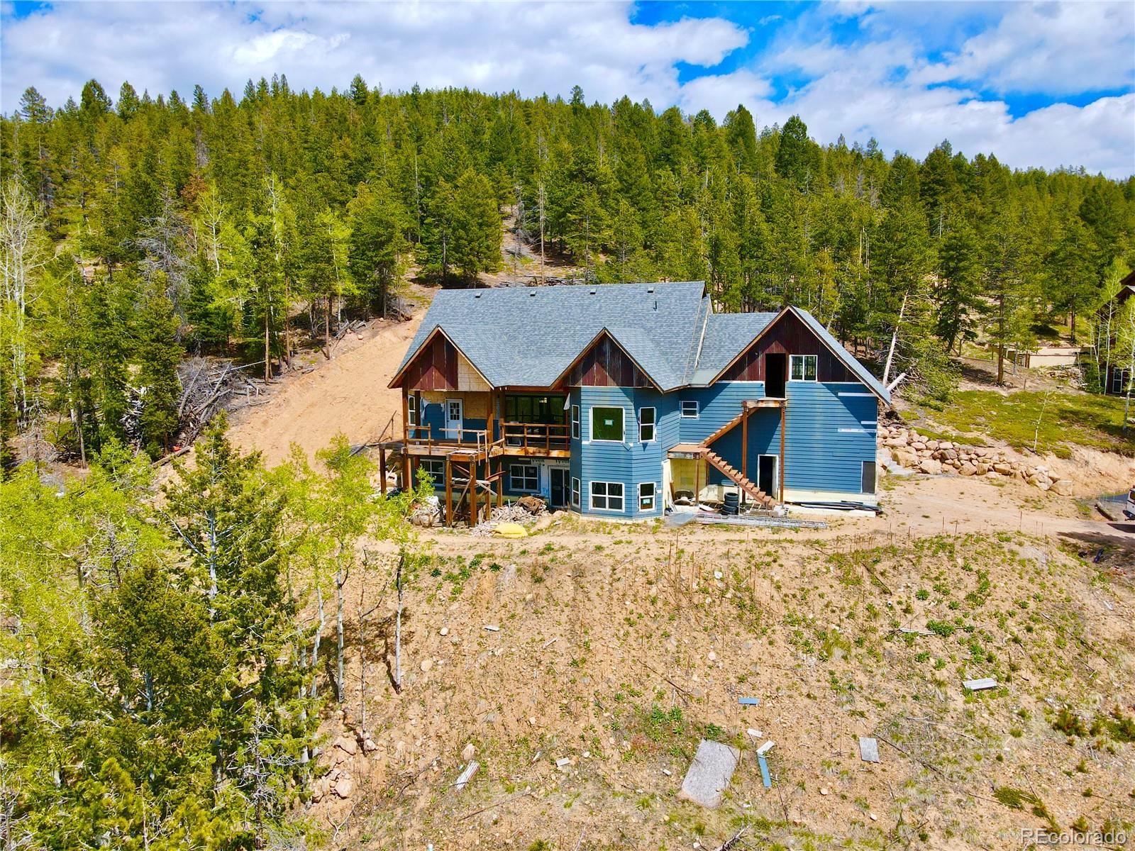 Black Mountain Ranch Estates Conifer Home | MLS #: 51557748642  Martin Lane, Conifer Beds: 4 Baths: 5 Price: $725,000