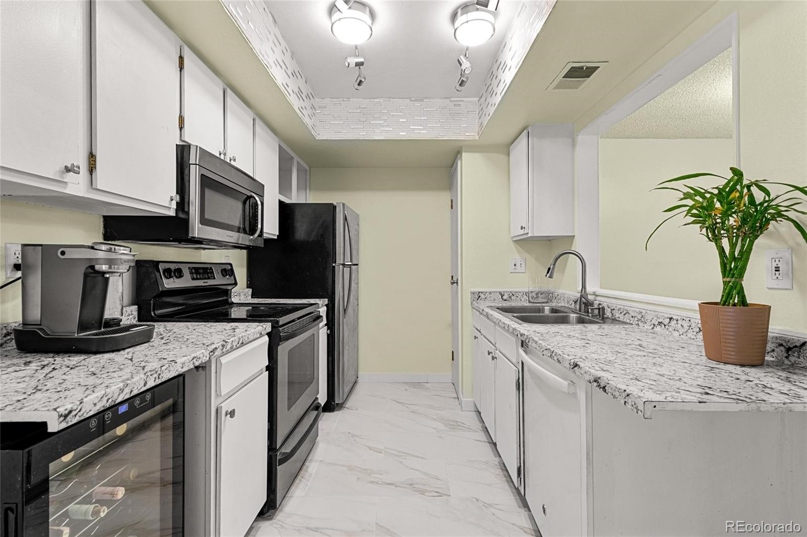 Pebble Creek Denver Condo / Townhome | MLS #: 50697993550 S Harlan Street 119, Denver Beds: 2 Baths: 3 Price: $350,000