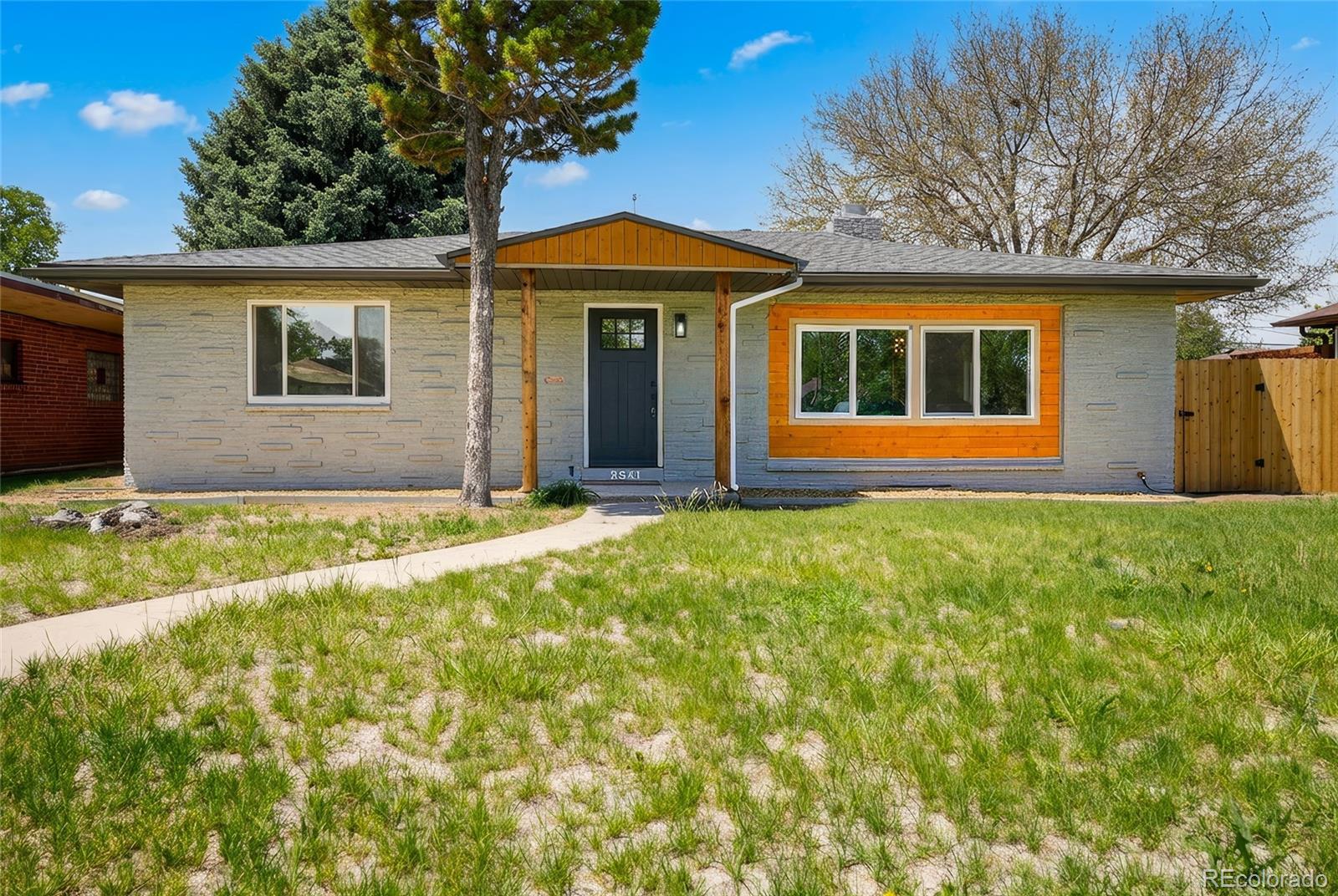 Oakland Denver Home | MLS #: 16698243541 N Monaco Parkway, Denver Beds: 4 Baths: 3 Price: $824,999