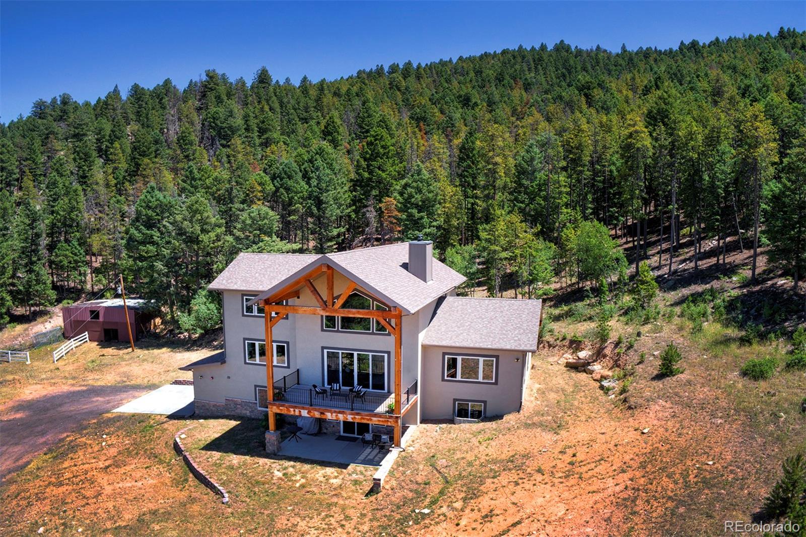 Aspen Park Conifer Home | MLS #: 389105925845  Sunny Aspen Trail, Conifer Beds: 4 Baths: 4 Price: $1,425,000