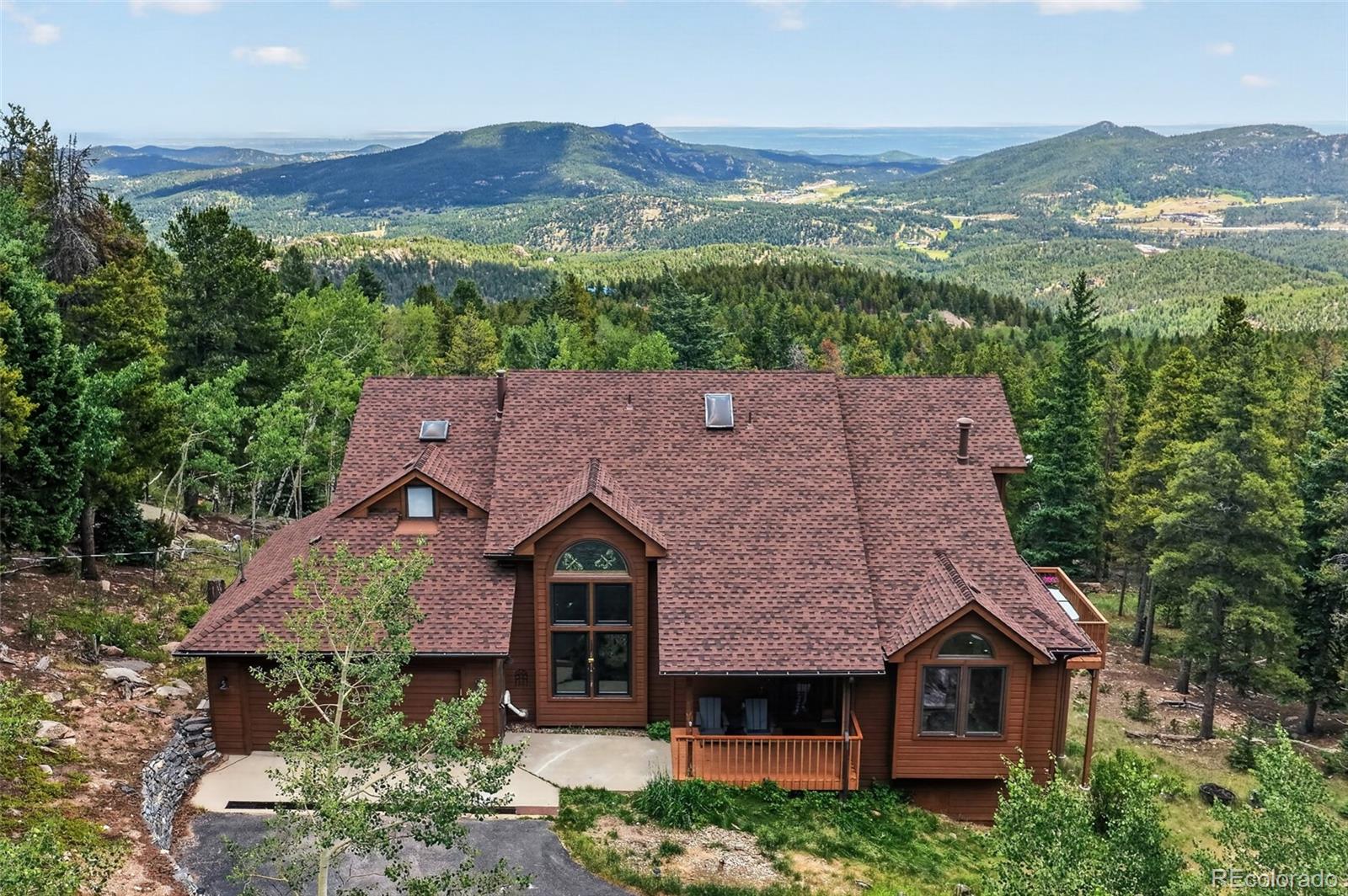 Conifer Mountain Conifer Home | MLS #: 635432131547  Conifer Mountain Drive, Conifer Beds: 4 Baths: 4 Price: $1,150,000
