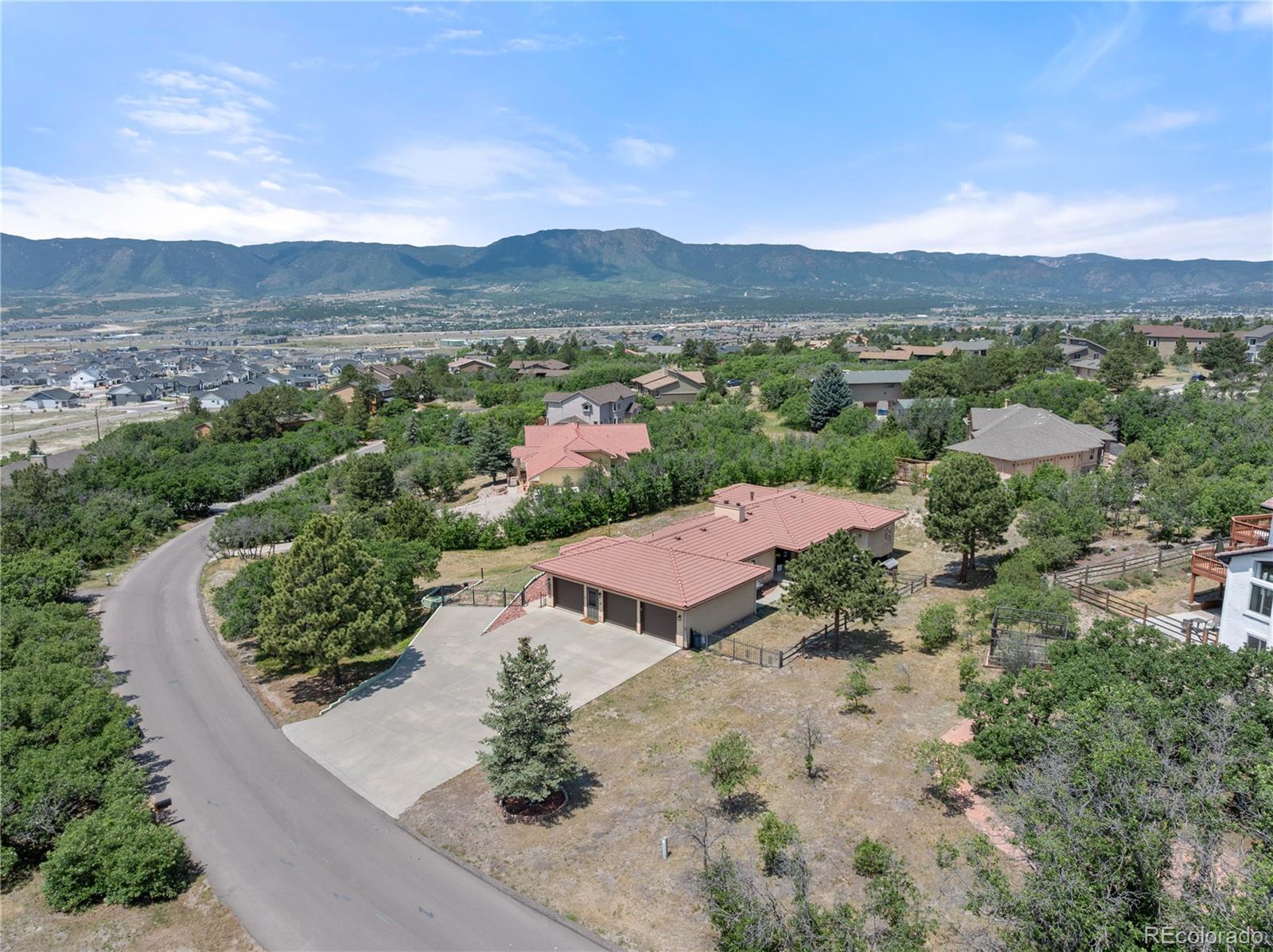 Woodmoor Monument Home | MLS #: 8798116380  Scrub Oak Circle, Monument Beds: 4 Baths: 3 Price: $775,000