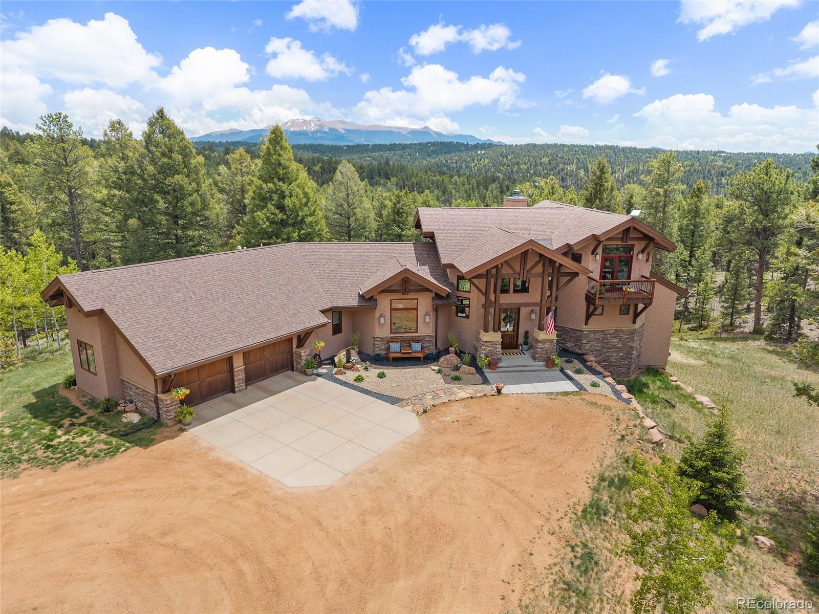 Florissant Canyon Divide Home | MLS #: 24720624267  County Road 51 , Divide Beds: 4 Baths: 4 Price: $2,499,999