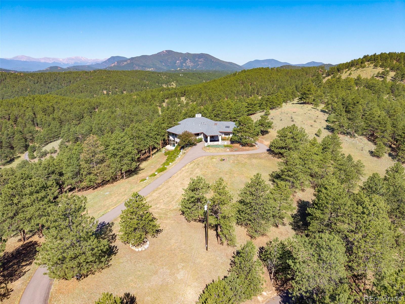  Evergreen Home | MLS #: 15212082828  Quartz Ridge Road, Evergreen Beds: 3 Baths: 4 Price: $1,500,000