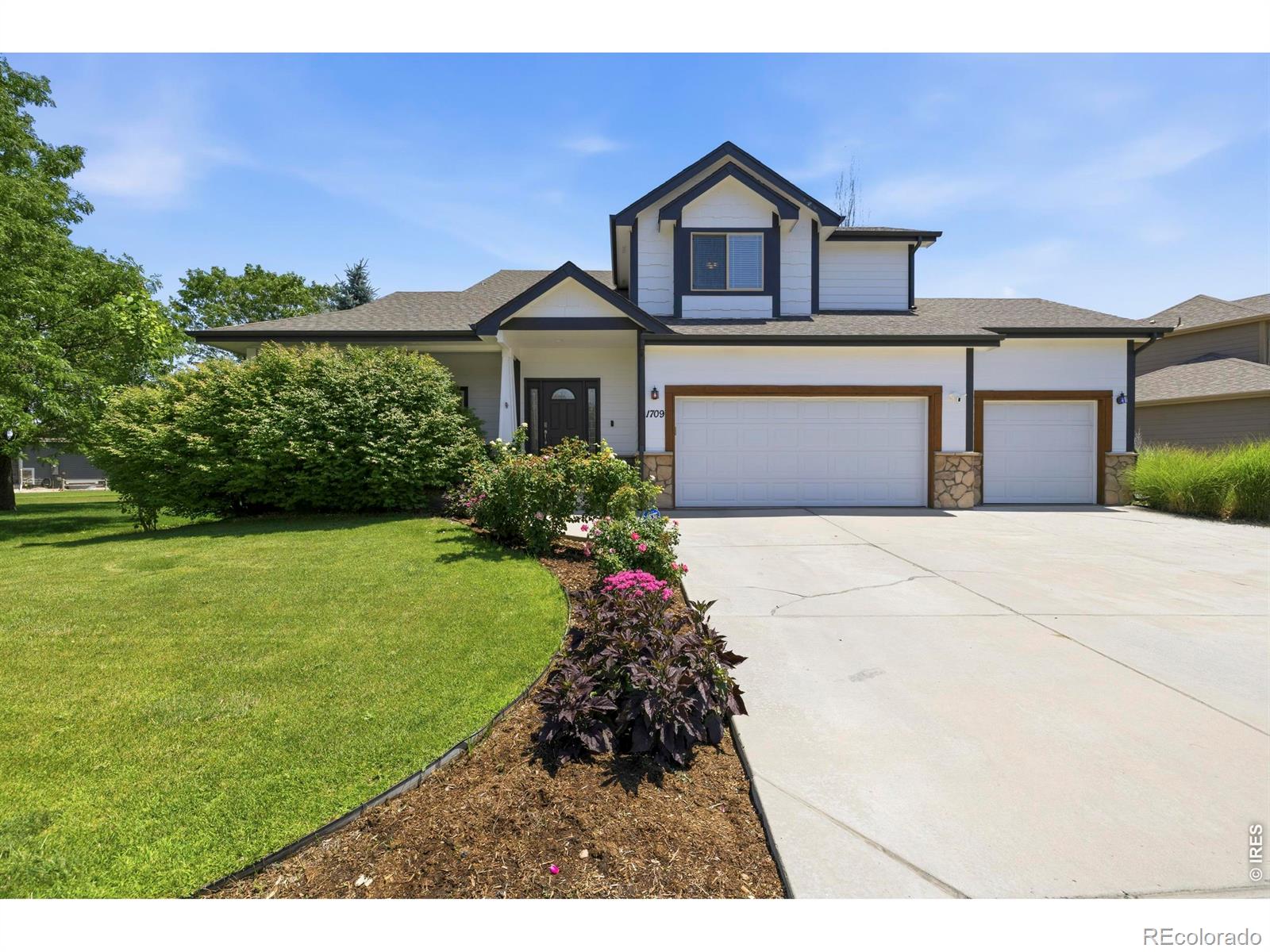 Poudre Heights Windsor Home | MLS #: 45678910632751709  Green River Drive, Windsor Beds: 5 Baths: 4 Price: $600,000