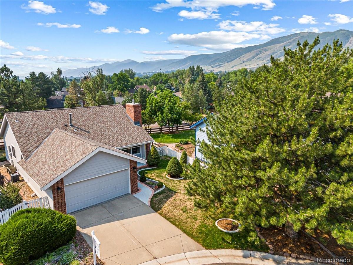 Ken Caryl Valley Littleton Home | MLS #: 87619516  Manzanita , Littleton Beds: 4 Baths: 3 Price: $890,000