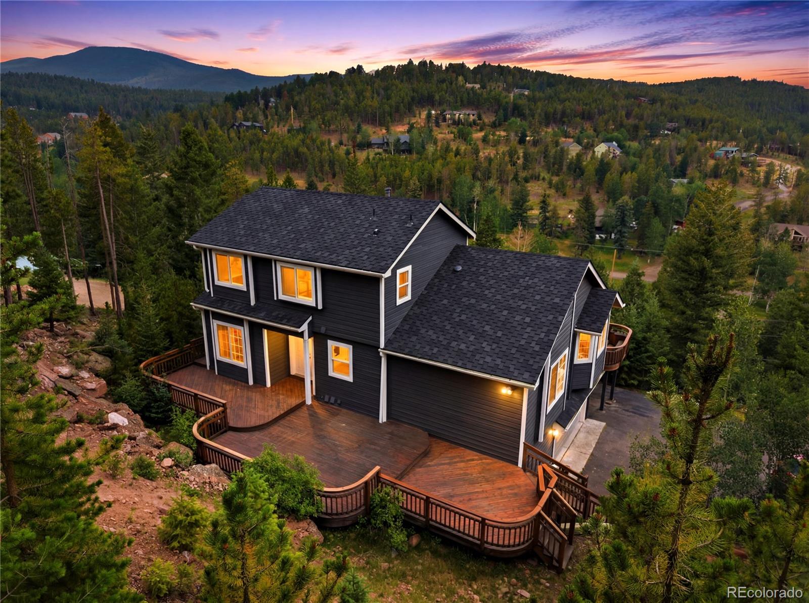 Buffalo Park Estates Evergreen Home | MLS #: 16191556932  Snowshoe Trail, Evergreen Beds: 4 Baths: 4 Price: $895,000