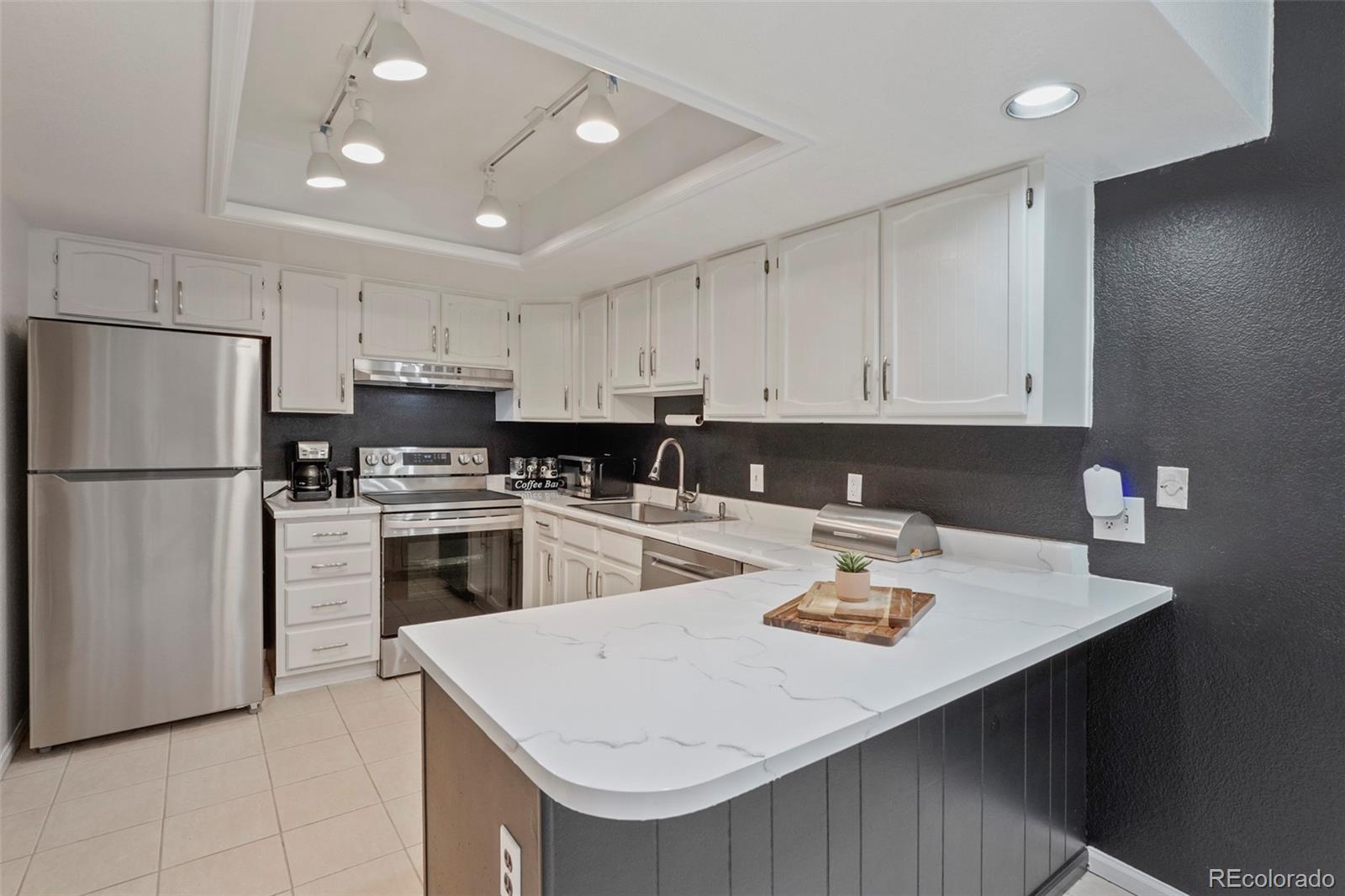  Aurora Home | MLS #: 365481915491 E Wyoming Drive, Aurora Beds: 2 Baths: 3 Price: $305,000