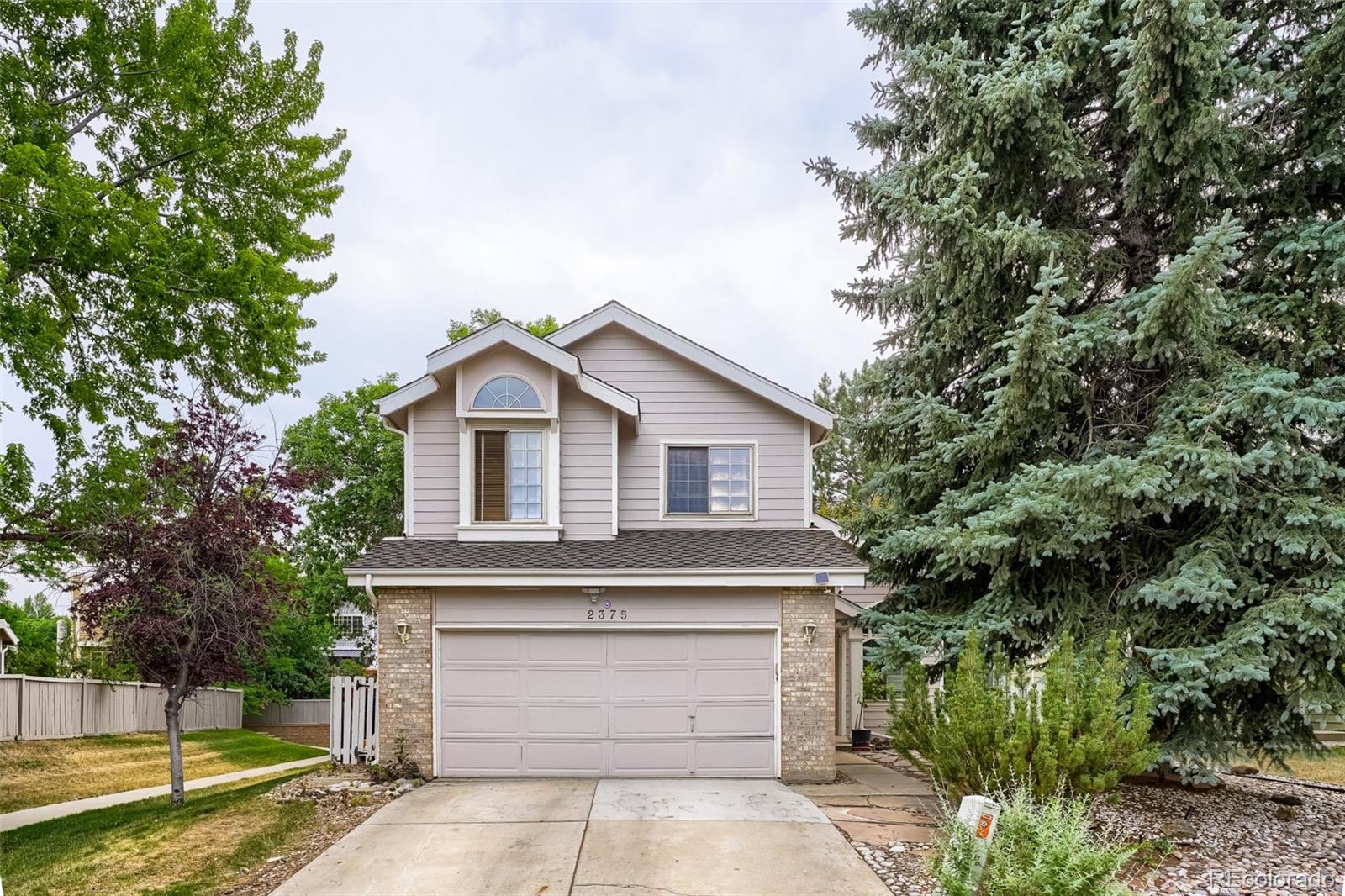 Woods Denver Home | MLS #: 48693402375 S Harlan Street, Denver Beds: 4 Baths: 5 Price: $649,900