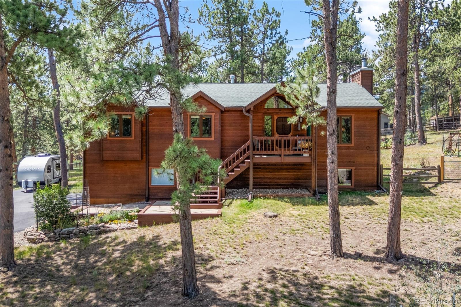  Evergreen Home | MLS #: 444719829866  Woods Drive, Evergreen Beds: 4 Baths: 3 Price: $985,000