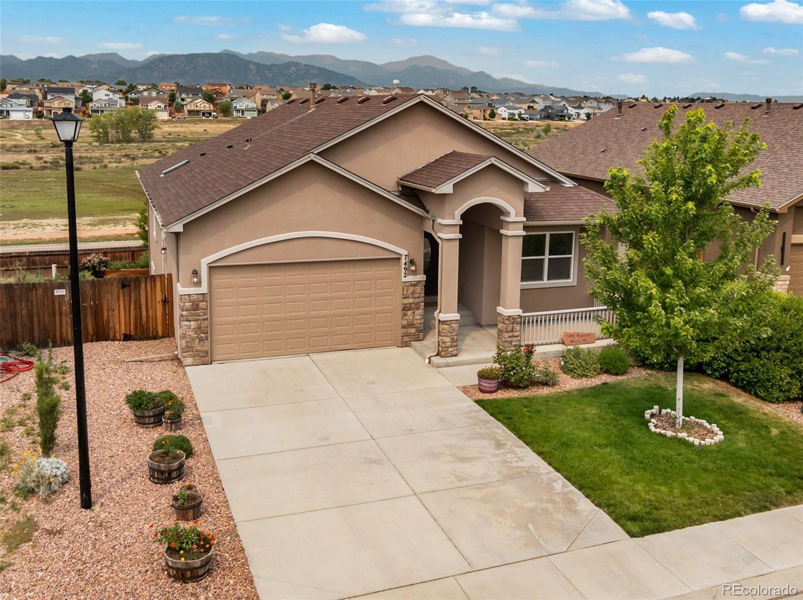  Colorado Springs Home | MLS #: 94288017492  Bigtooth Maple Drive, Colorado Springs Beds: 4 Baths: 3 Price: $575,000