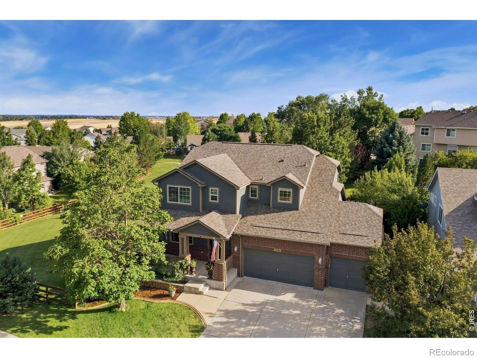 Ridgewood Hills Fort Collins Home | MLS #: 45678910657847374  New Raymer Court, Fort Collins Beds: 5 Baths: 4 Price: $675,000