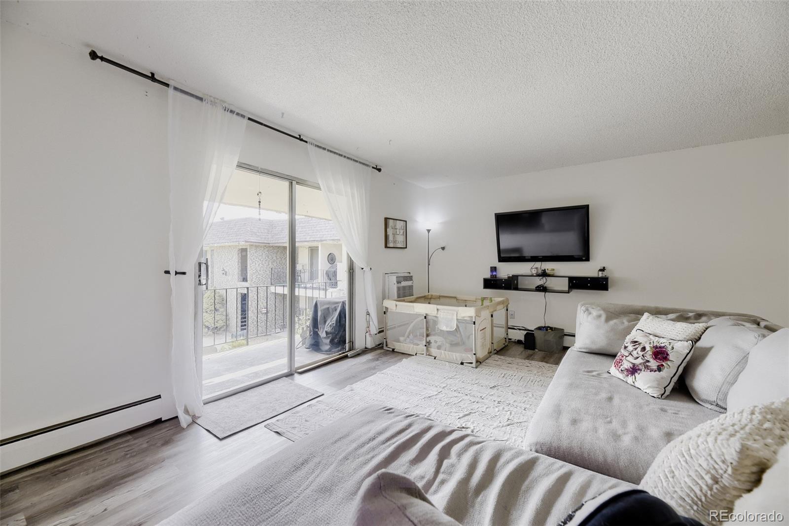 Westchester North Denver Condo / Townhome | MLS #: 41262264531 S Lowell Boulevard C, Denver Beds: 2 Baths: 1 Price: $179,995
